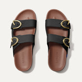 The Buckle Slide Sandal in Black shown from the top.