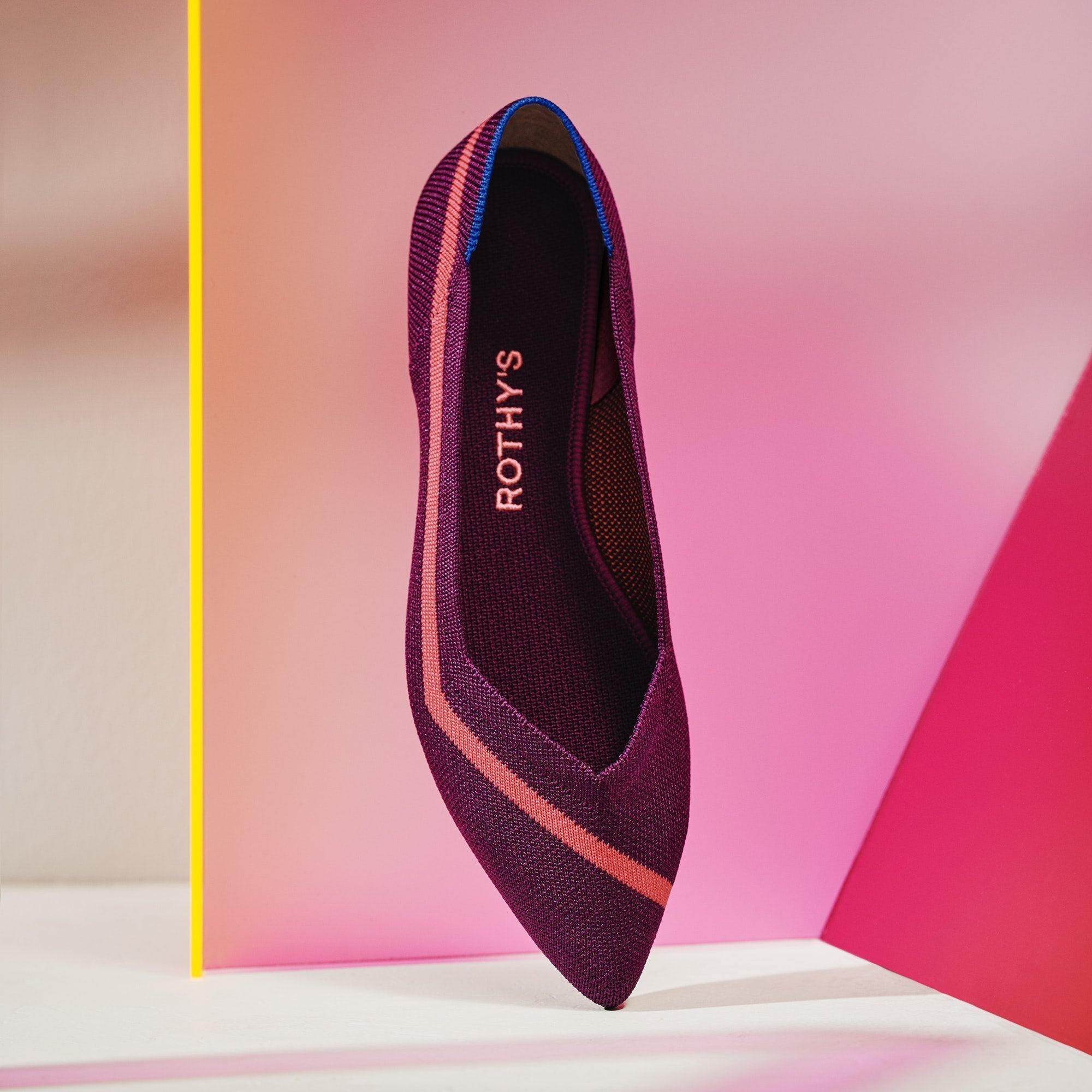 The Point in Maroon Neon Stripe shown from the front.