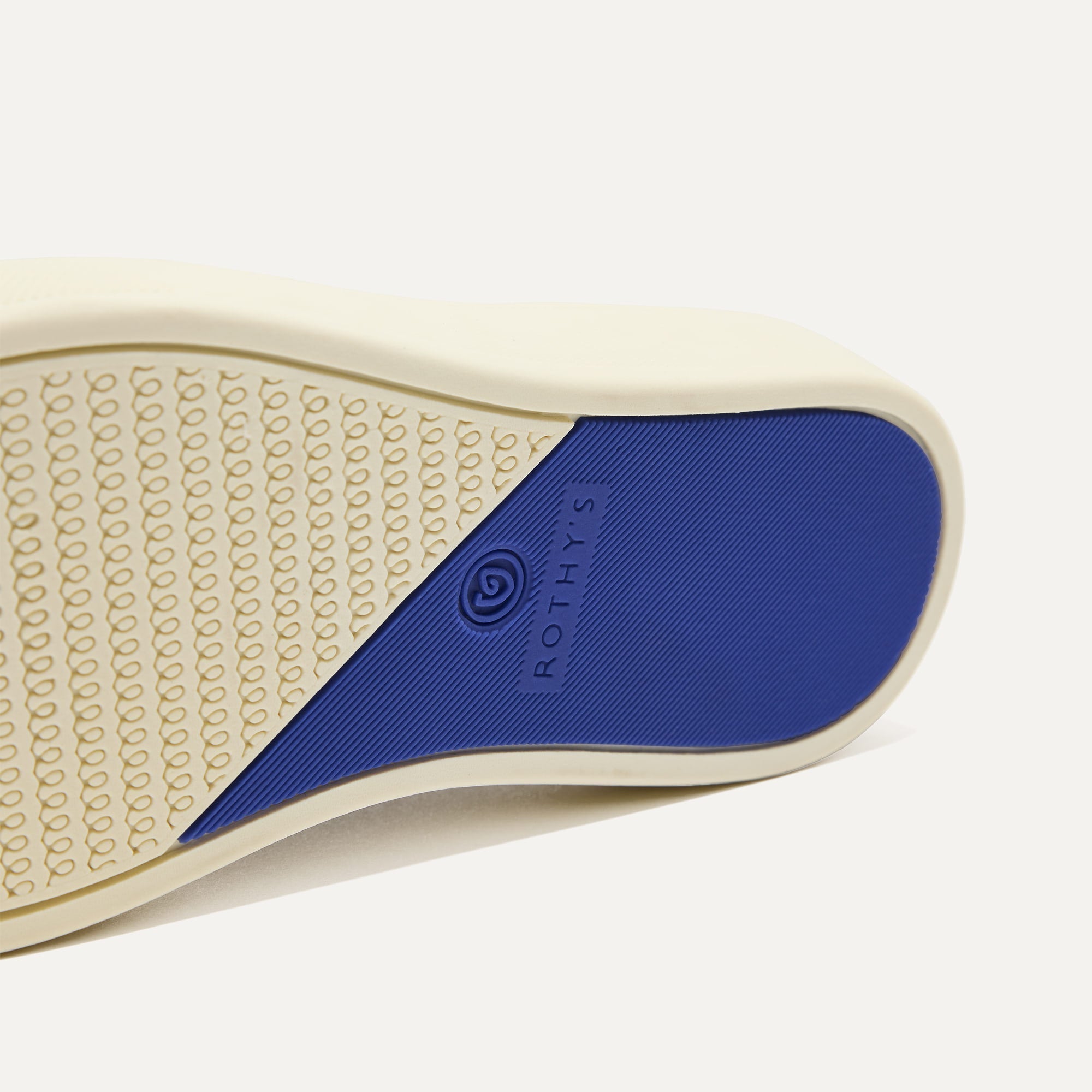 The sole of The Kids Sneaker in Desert Cat.