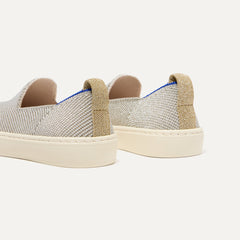 Close up of the heel of The Kids Sneaker in Diamond Twill, with shimmery gold pull tab.