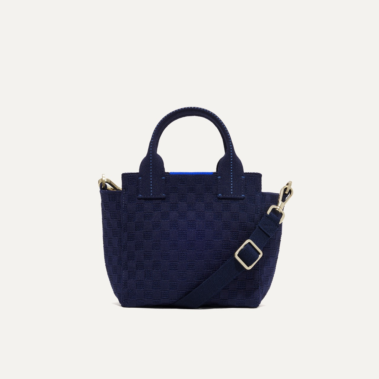 PLP |The Mini Handbag in Nautical Navy shown from the front.