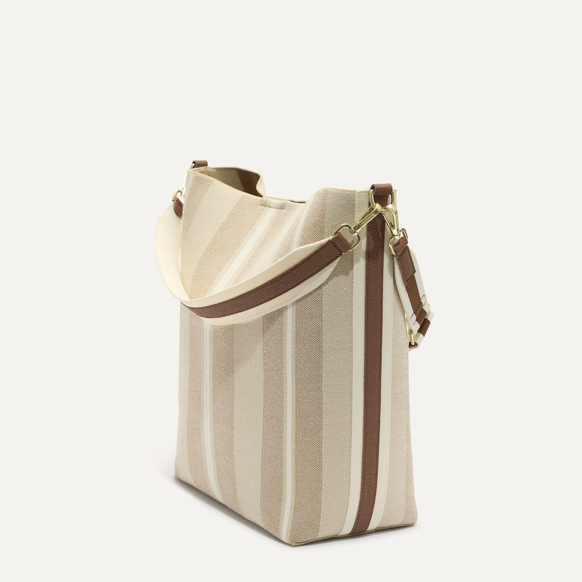 The Bucket Bag in Oat Latte shown in a diagonal view.