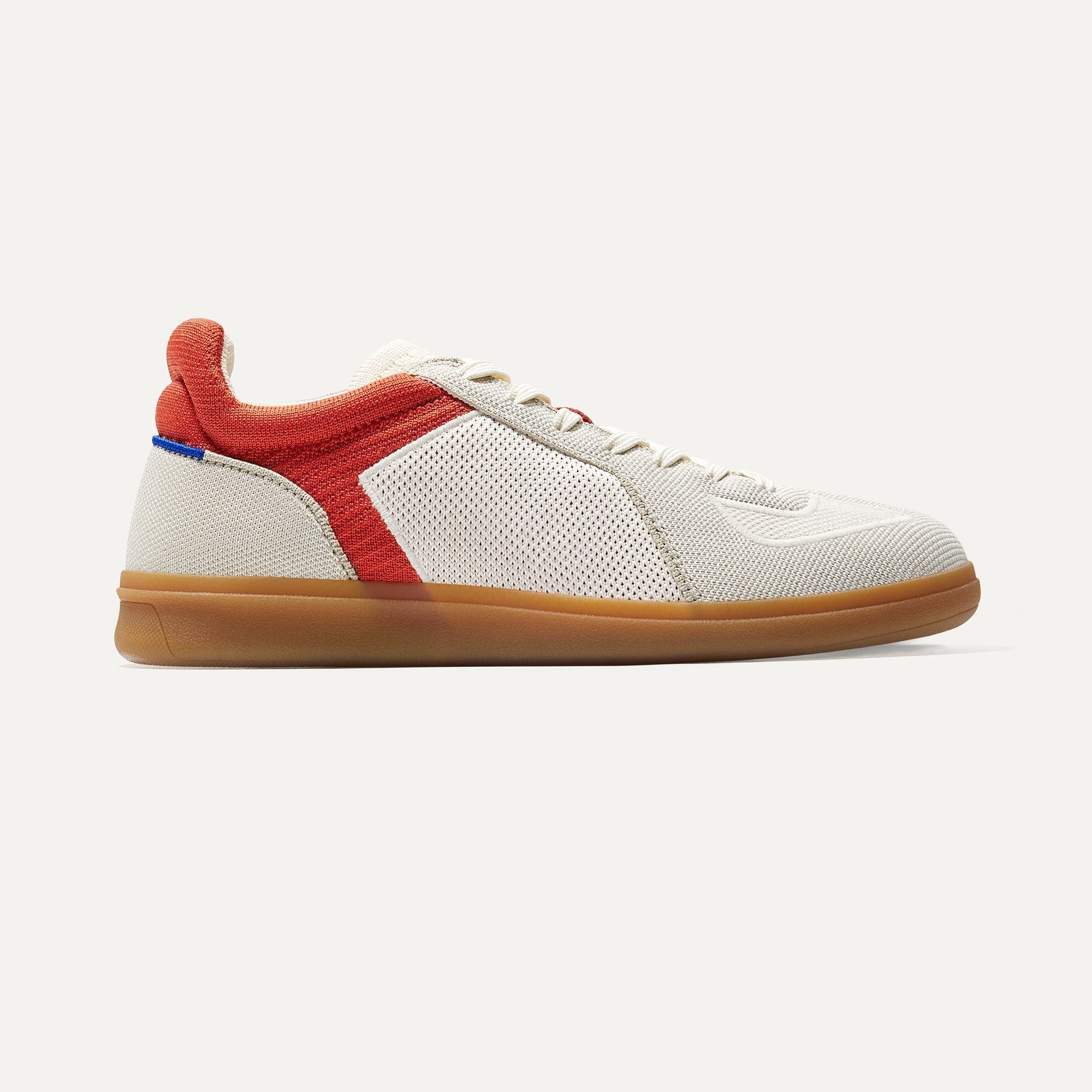 The RS01 Sneaker in crimson shown from the side.