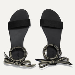 A pair of The Wrap slide sandals in Cosmos shown from the top view.