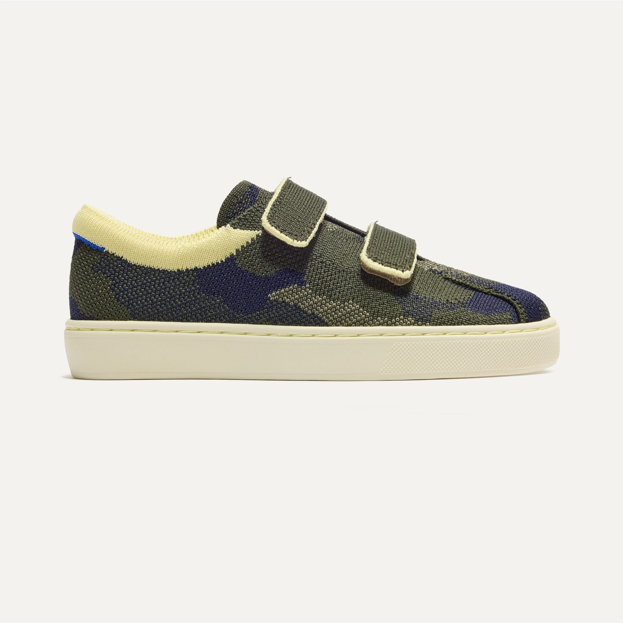 side | The Kids Strap Sneaker in Spruce Camo shown from the side. 