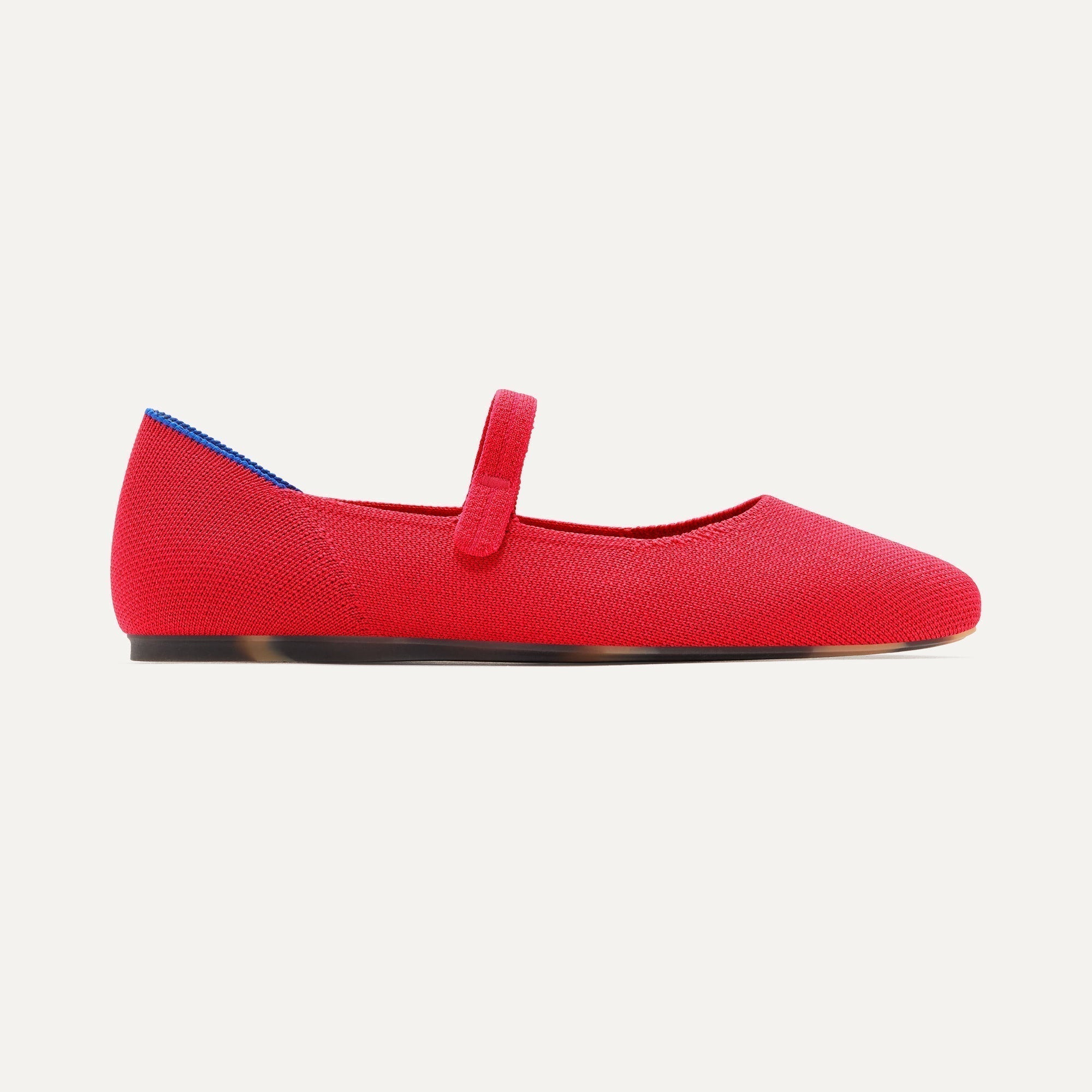 side | The Square Mary Jane in Lollipop Red shown from the side.