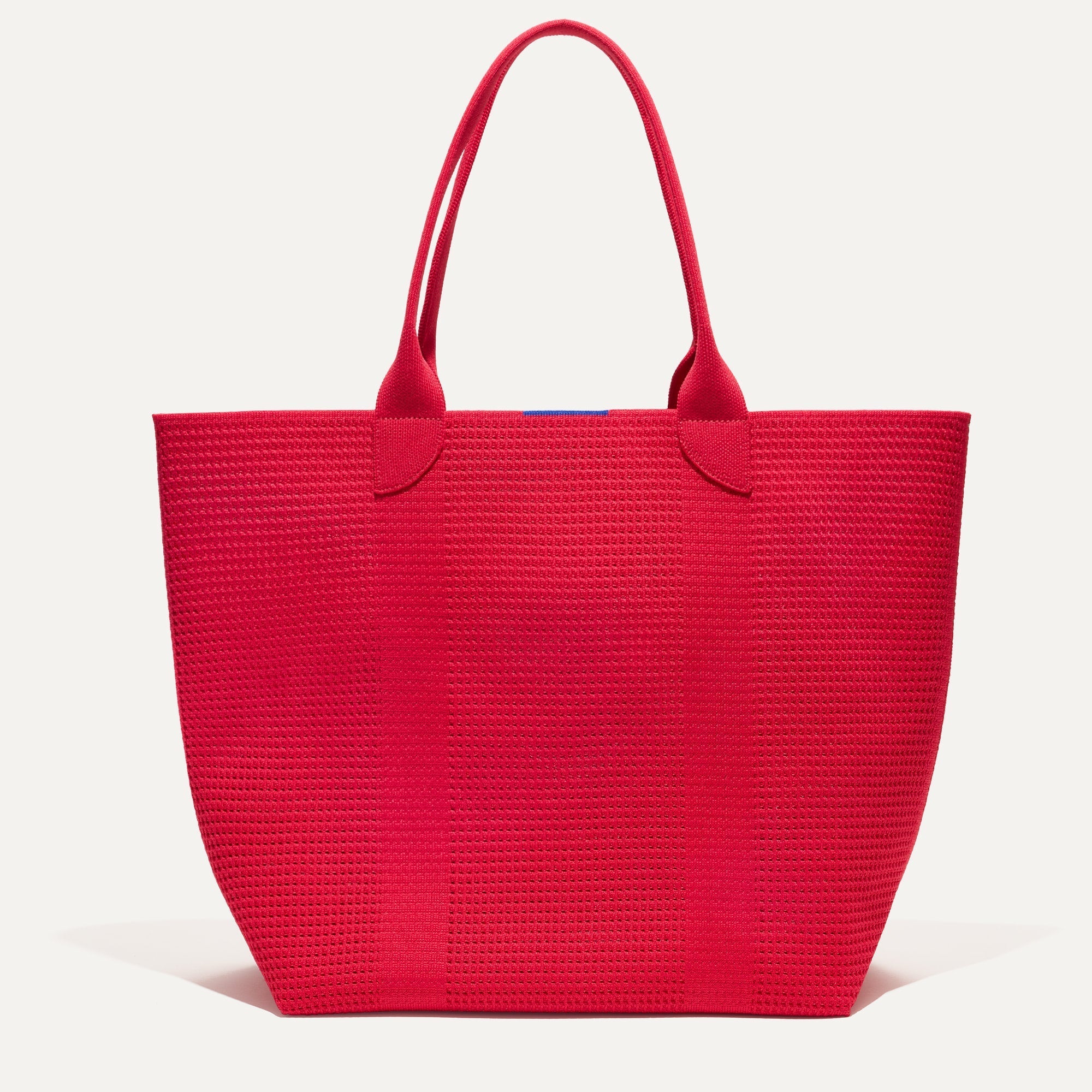 PLP |The Lightweight Tote in Lollipop Perf shown from the front. 