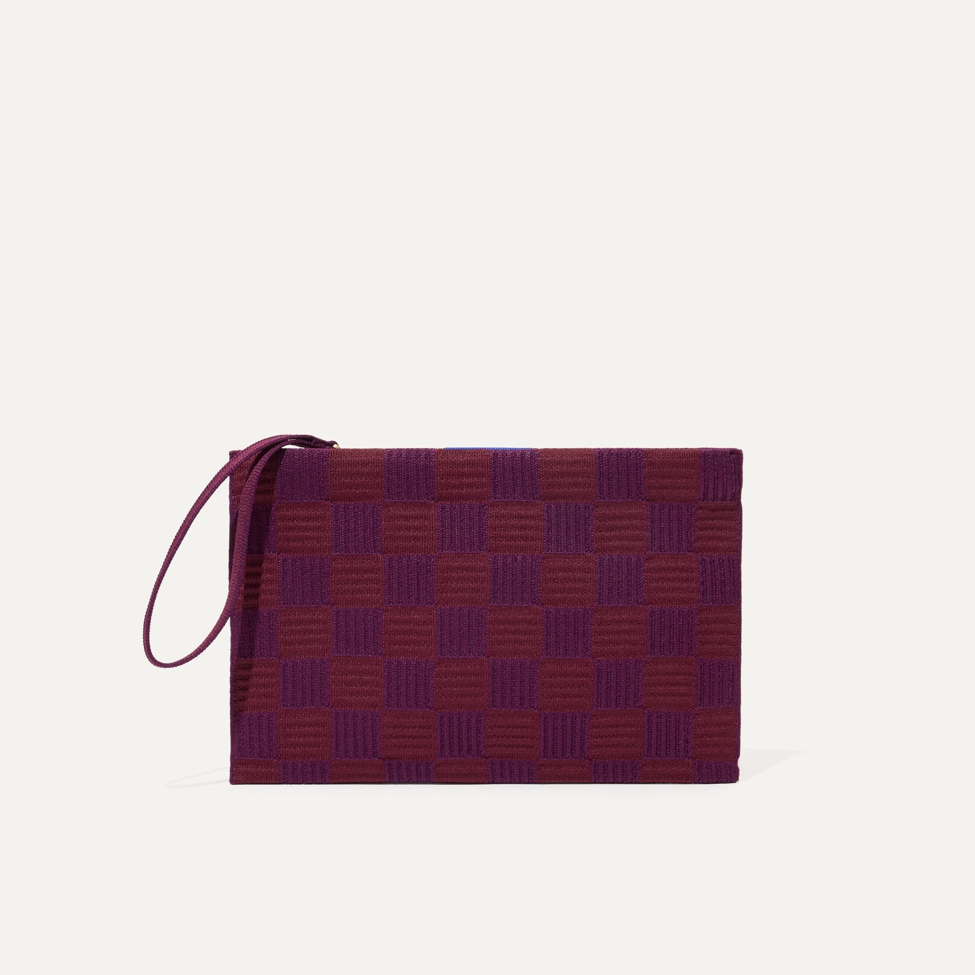 PLP |The Wristlet in Checker Plum shown from the front. 
