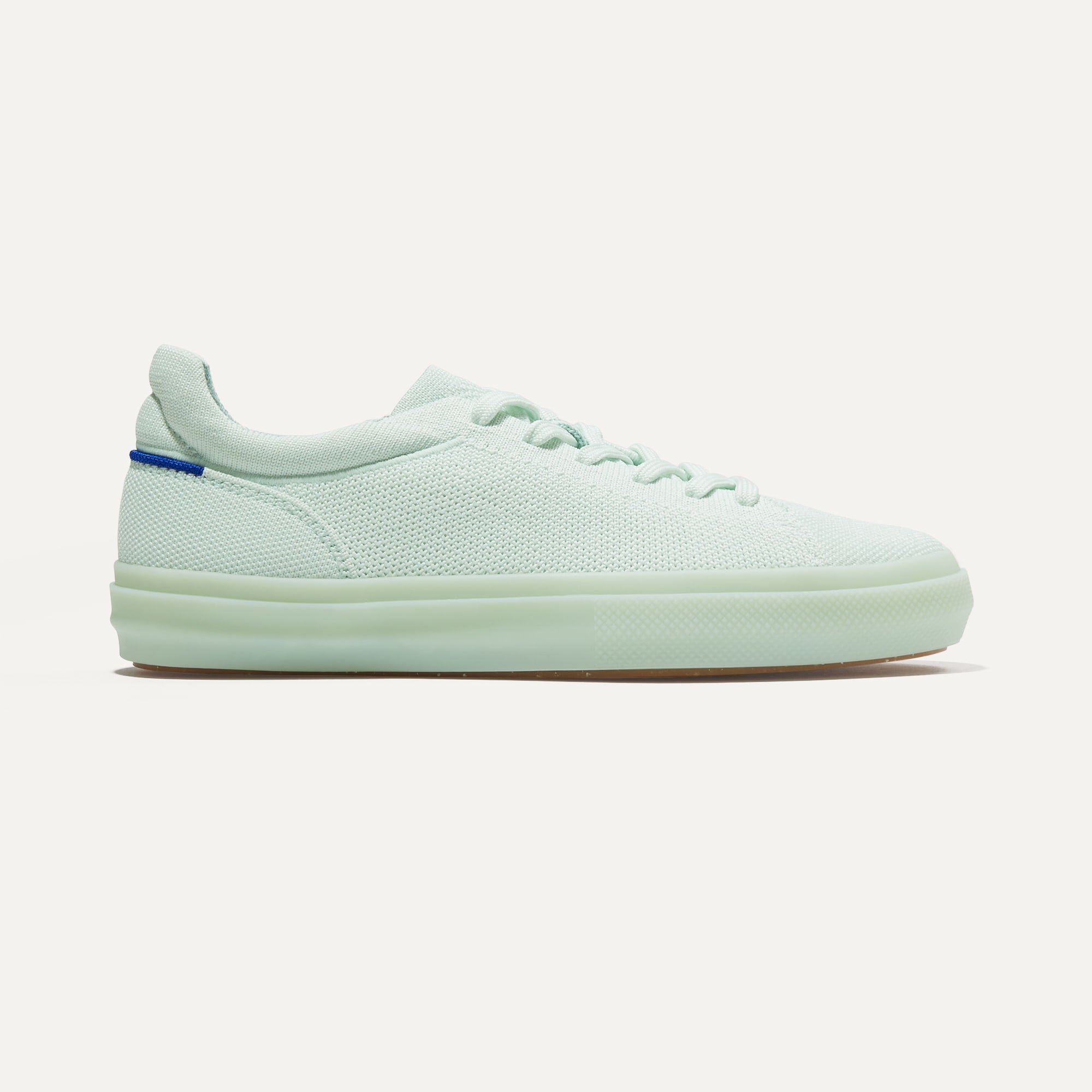 The RS02 Sneaker in Aquamarine shown from the side.