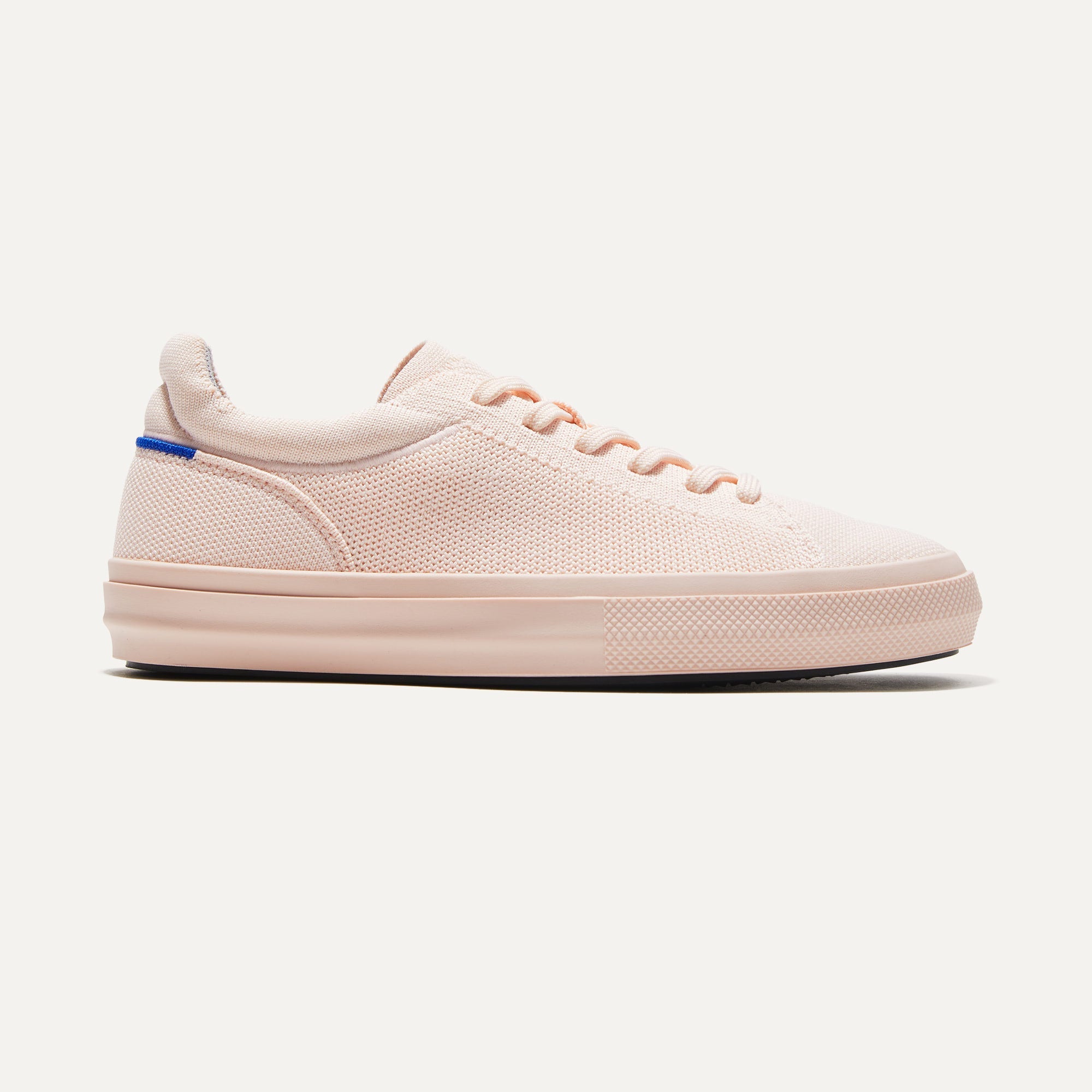 The RS02 Sneaker in Pink shown from the side.