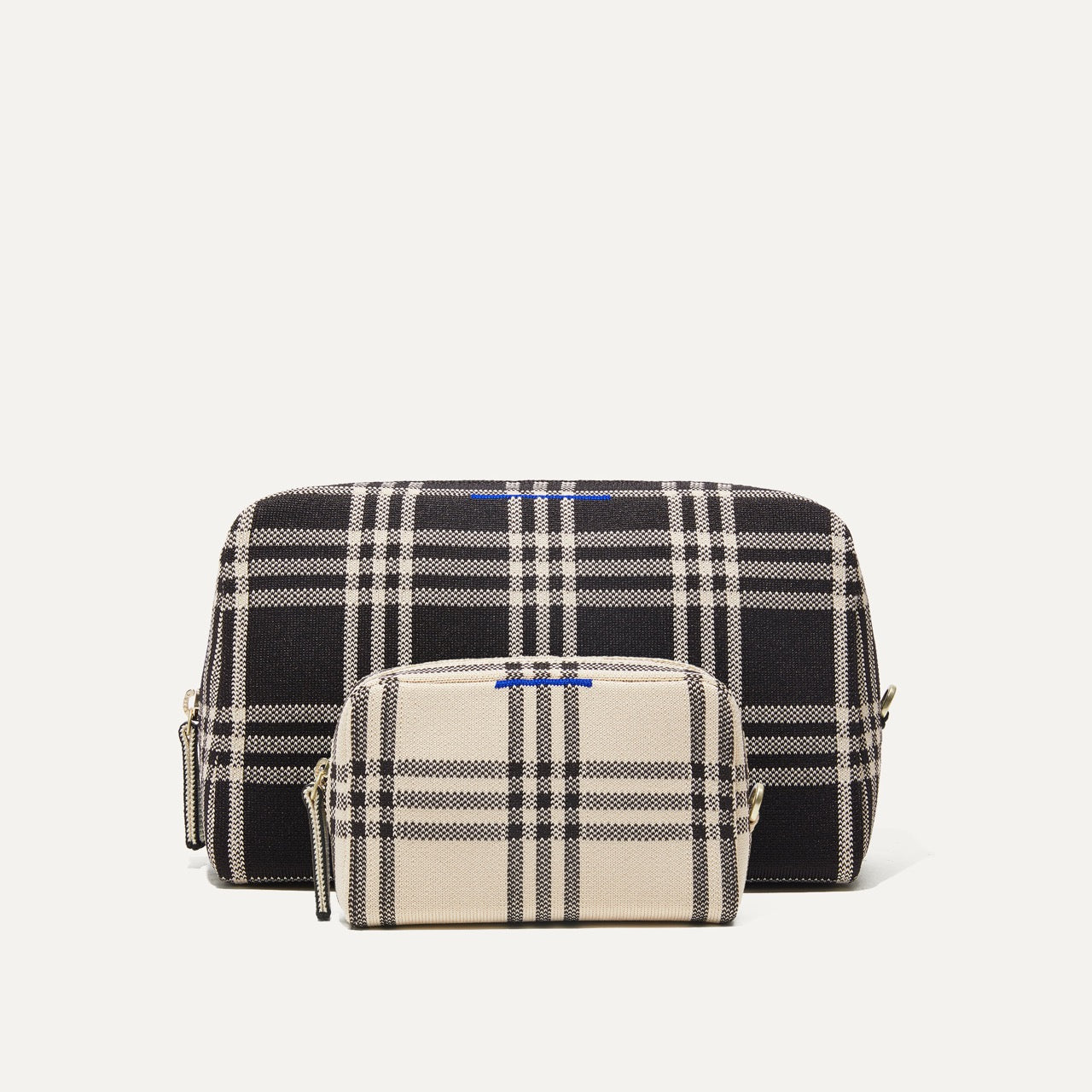PLP |The Universal Pouch Set in Black and Cream Plaid, shown from the front.