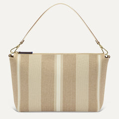 PDP |The Daily Crossbody Bag in Oat Latte shown from the front.