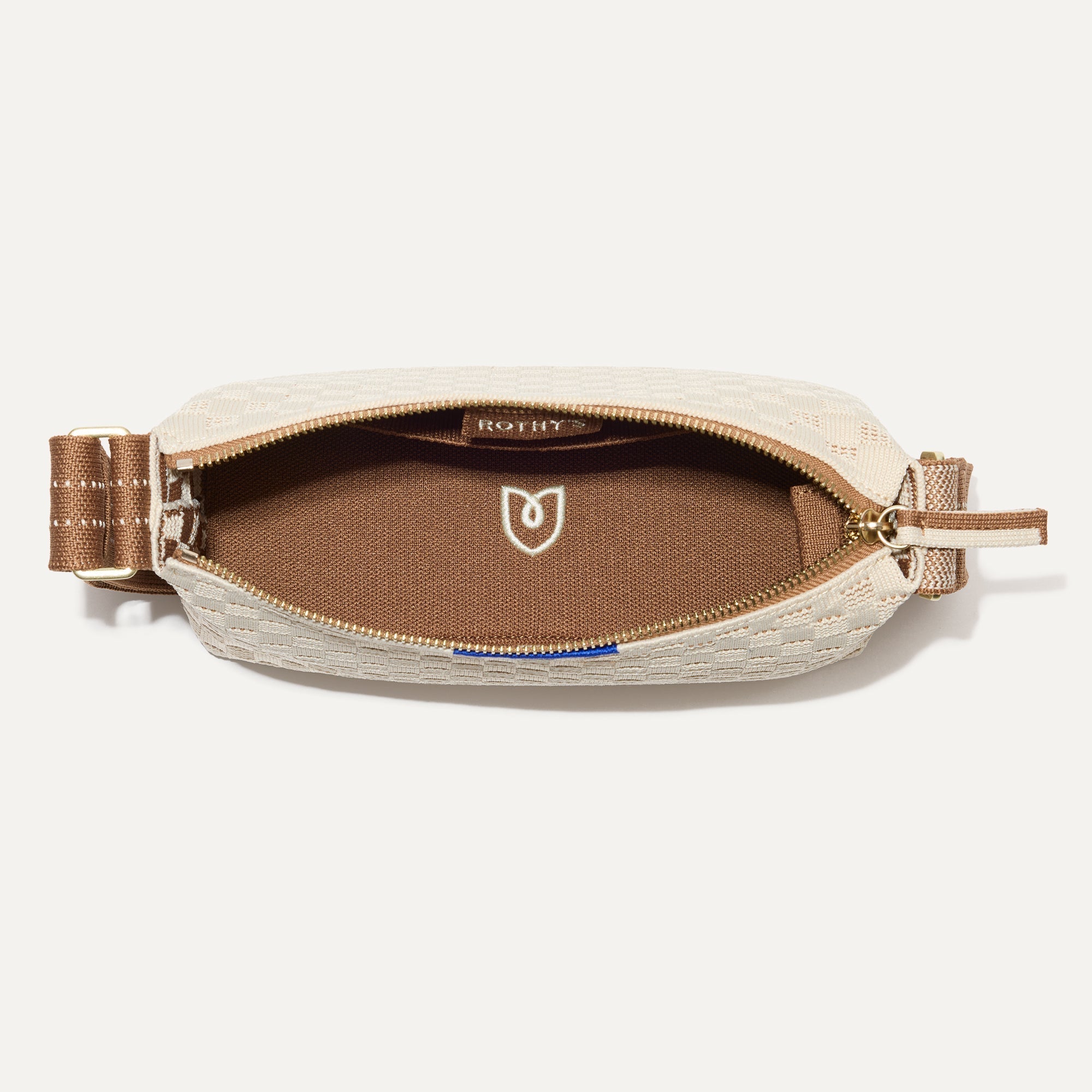 The Casual Crossbody in Vanilla Wafer, shown from above, with the interior exposed. 