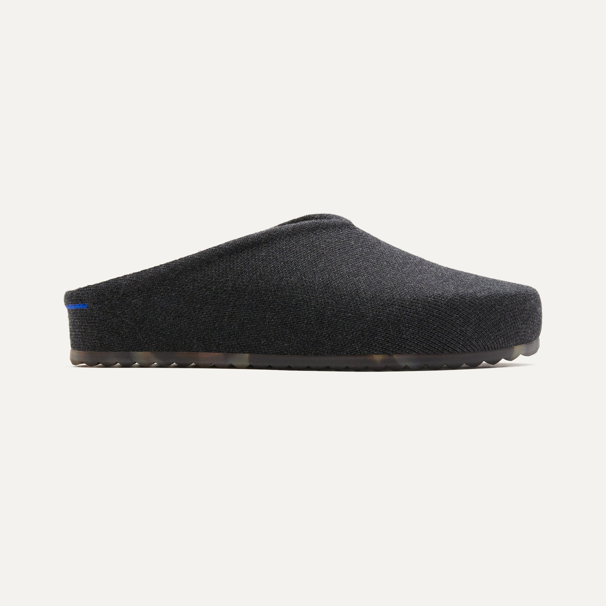 side | The Casual Clog in Soft Black shown from the side.