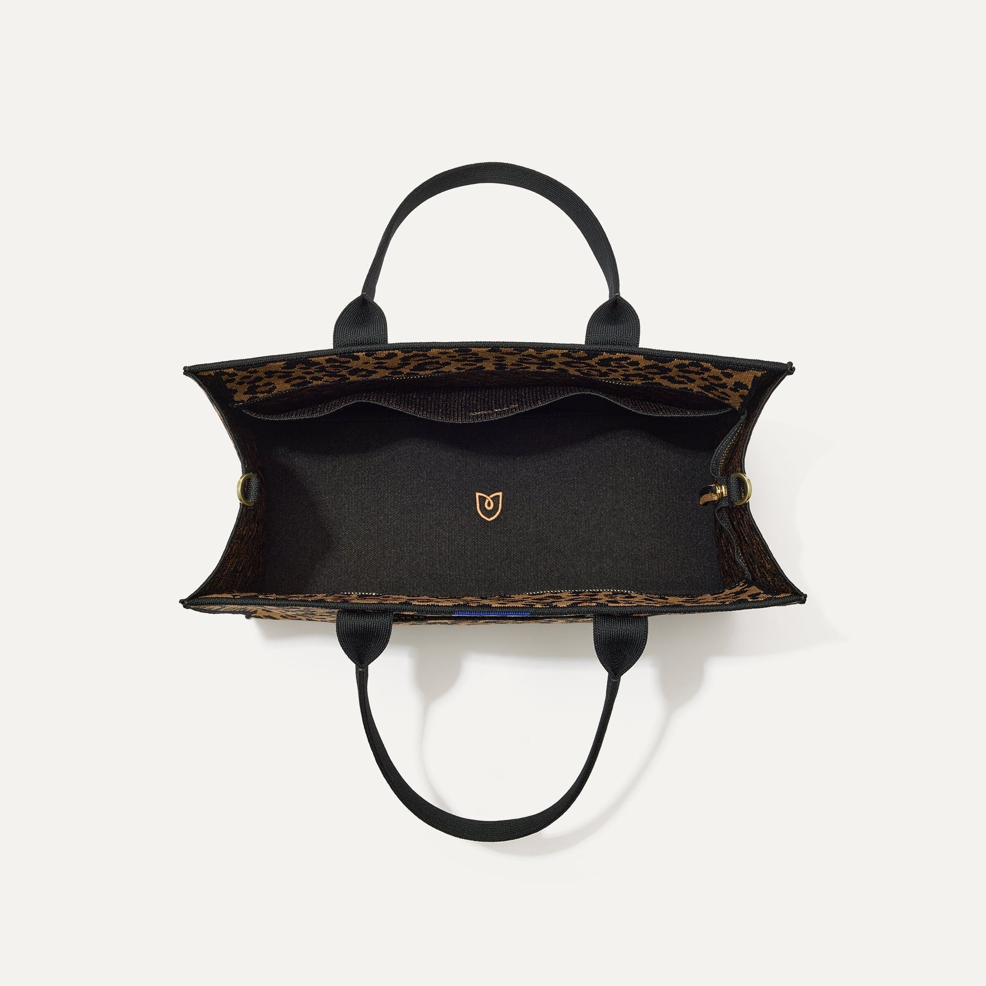 The Classic Tote in Toasty Cat, shown from above, with the interior exposed.