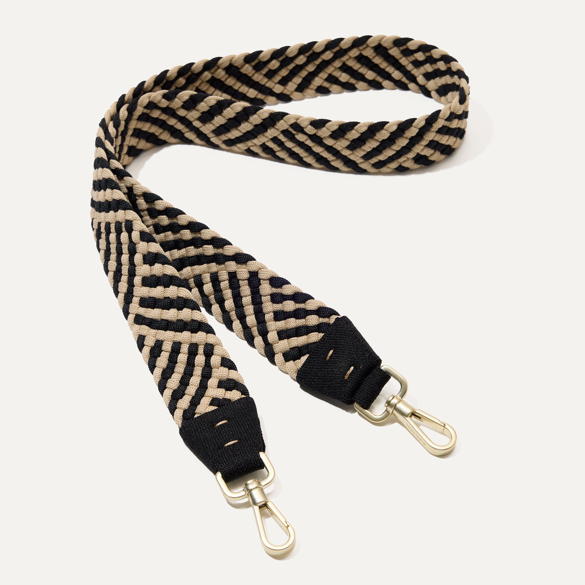 The Crossbody Strap in Black and Ivory Woven.