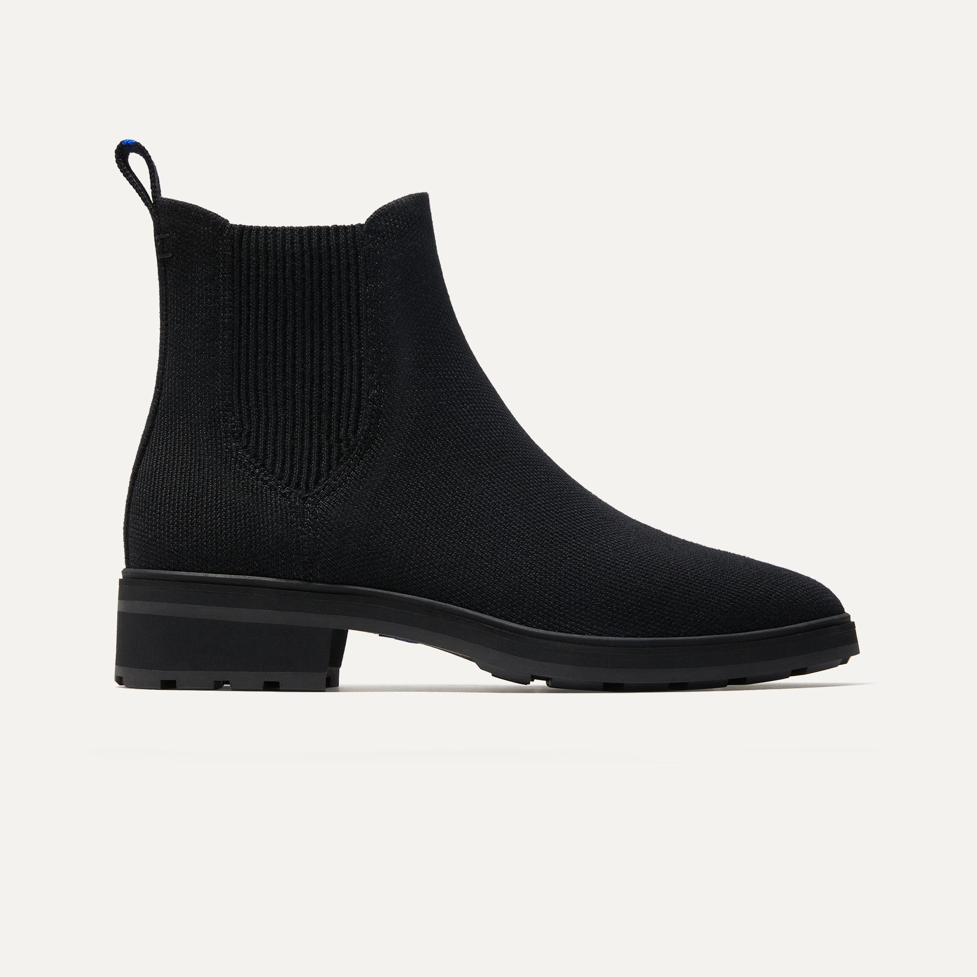 The Lug Boot in Onyx Black shown from the side. 