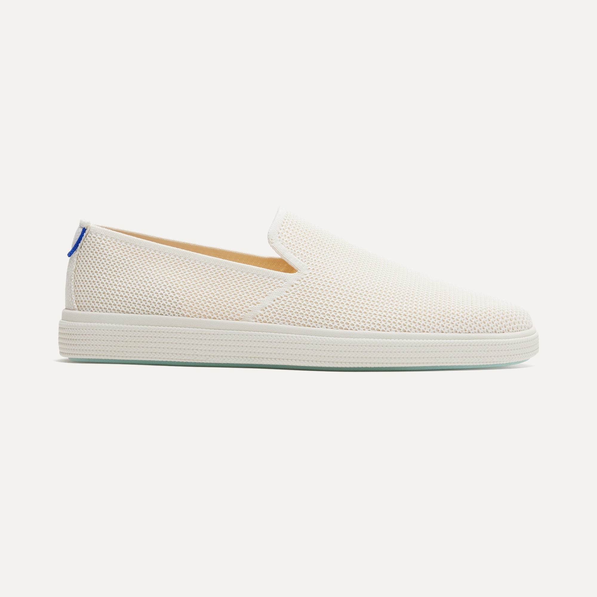 The Ravello Slip On Sneaker in Whitecap shown from the side. 