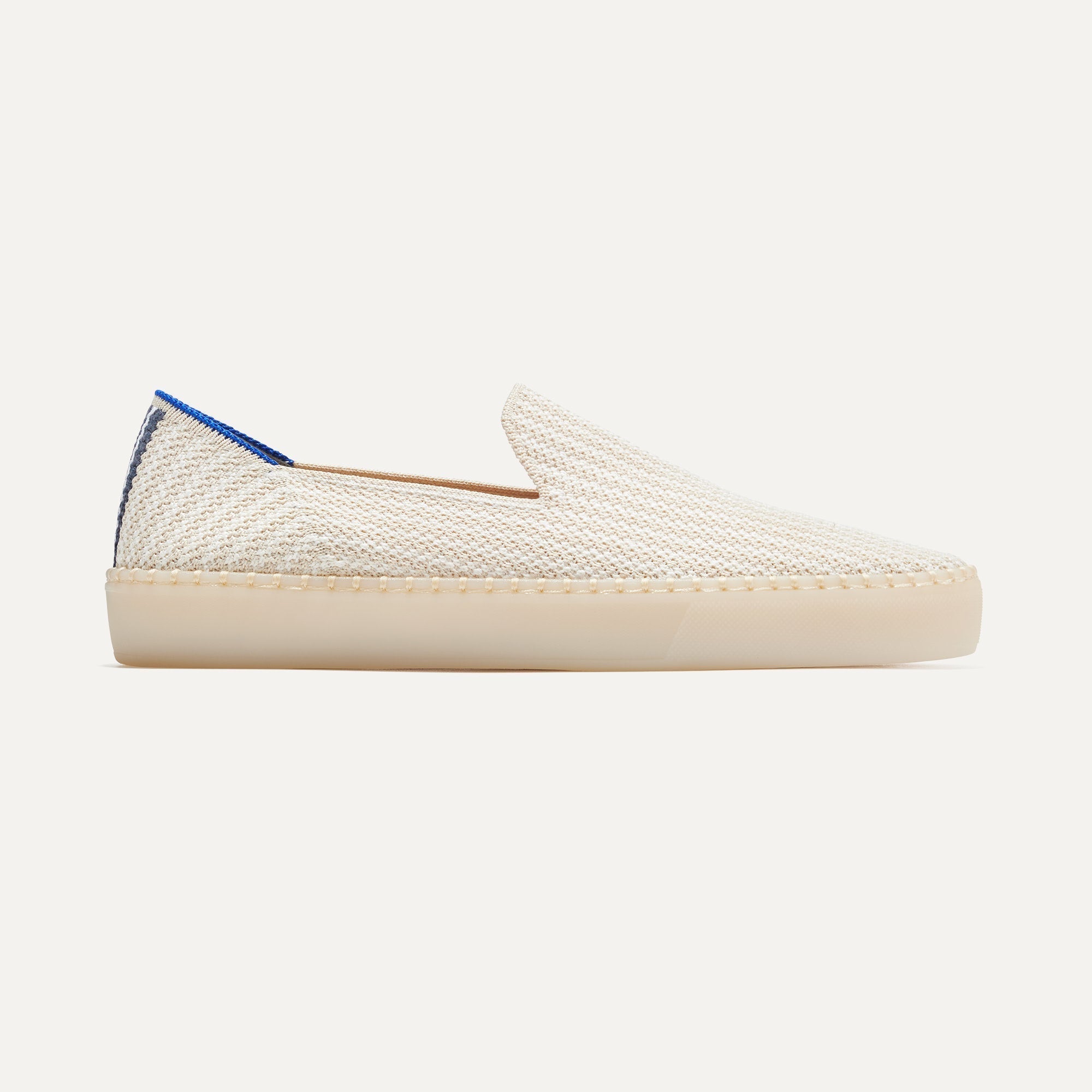 The Original Slip On Sneaker in Coconut Stripe shown from the side. 