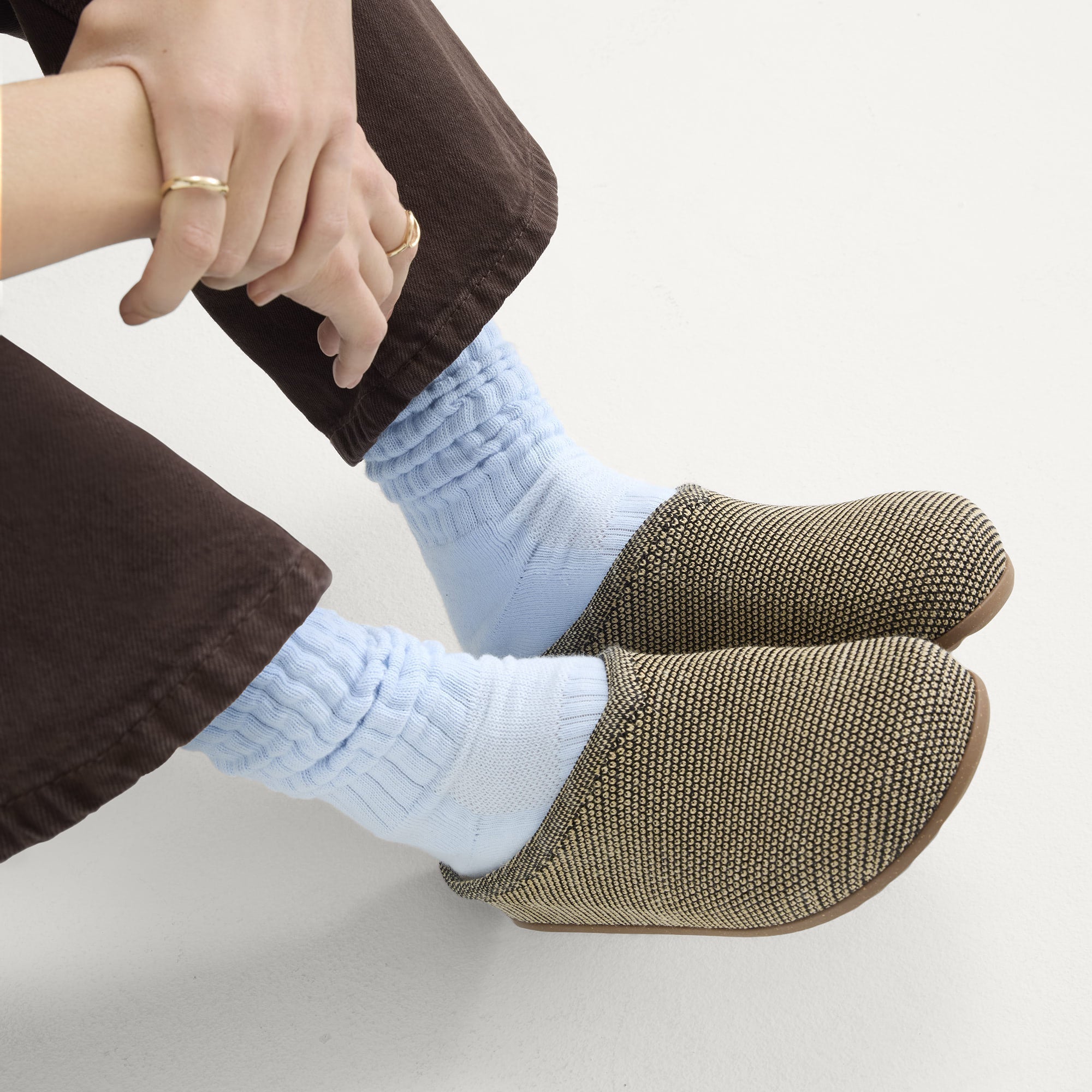 hover | Model wearing The Casual Clog in Toffee Raffia-Knit.