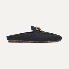 side | The Double Bit Loafer Mule in Black shown from the side.