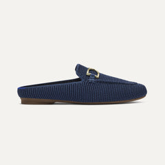 side | The Double Bit Loafer Mule in Blue Raffia-Knit shown from the side.
