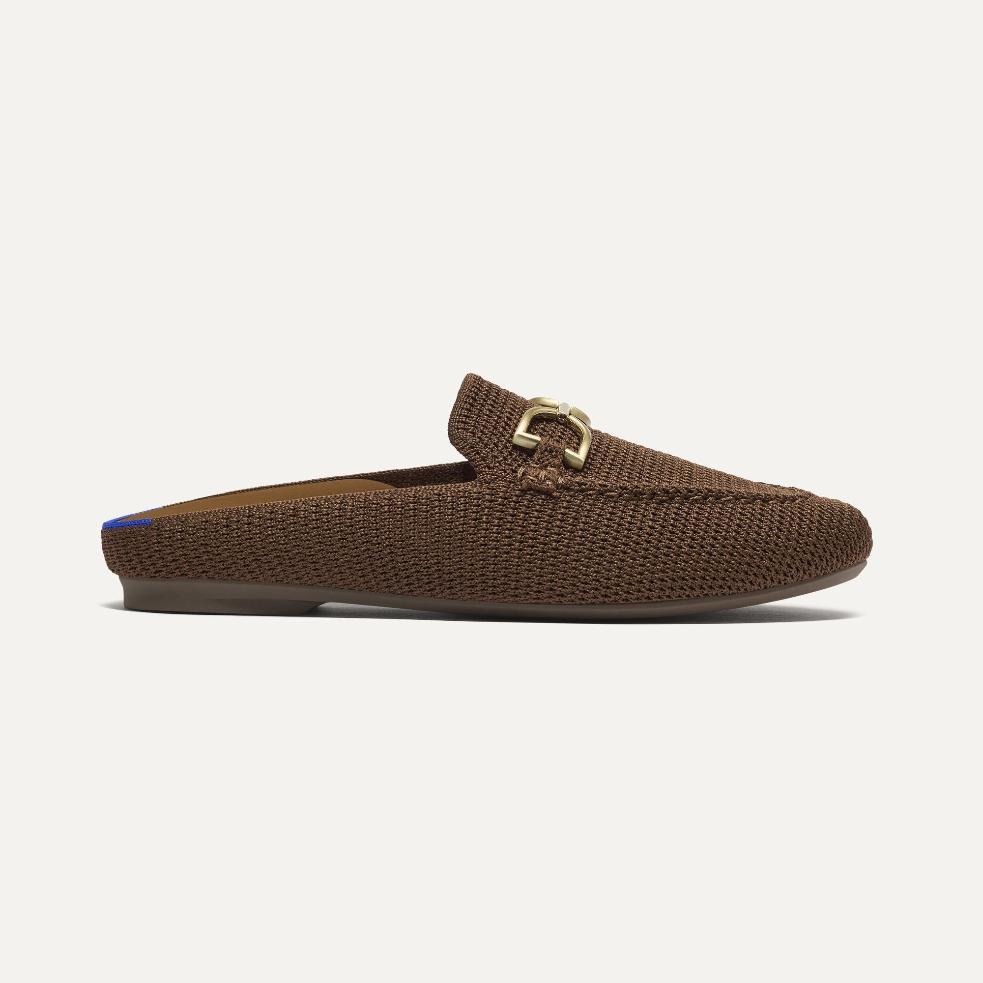 side | The Double Bit Loafer Mule in Cinnamon Raffia-Knit shown from the side.