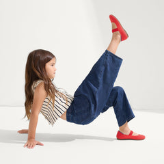 hover | Model wearing The Kids Mary Jane in Glamour Red.