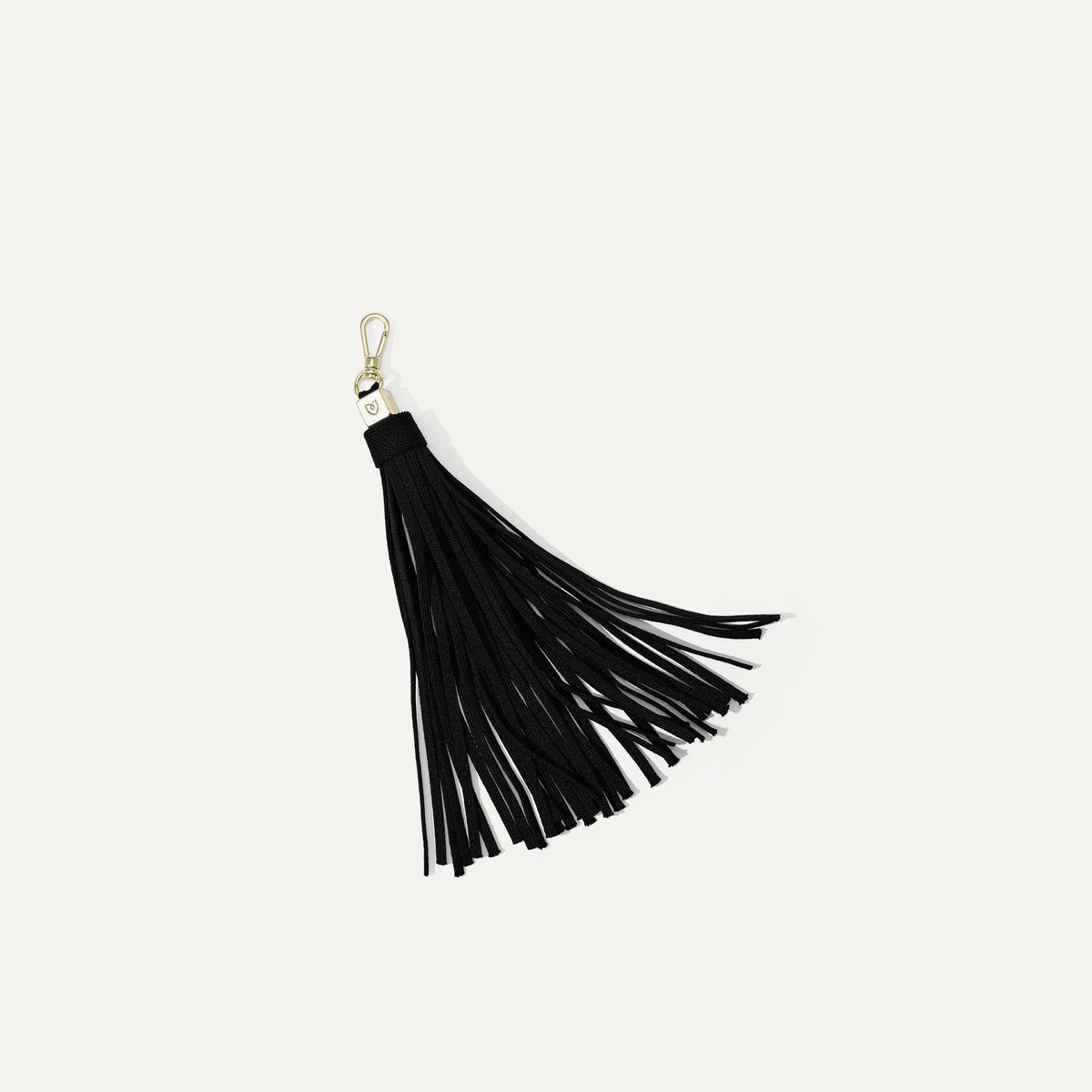 PLP |The Tassel Clip in Black shown from the front. 