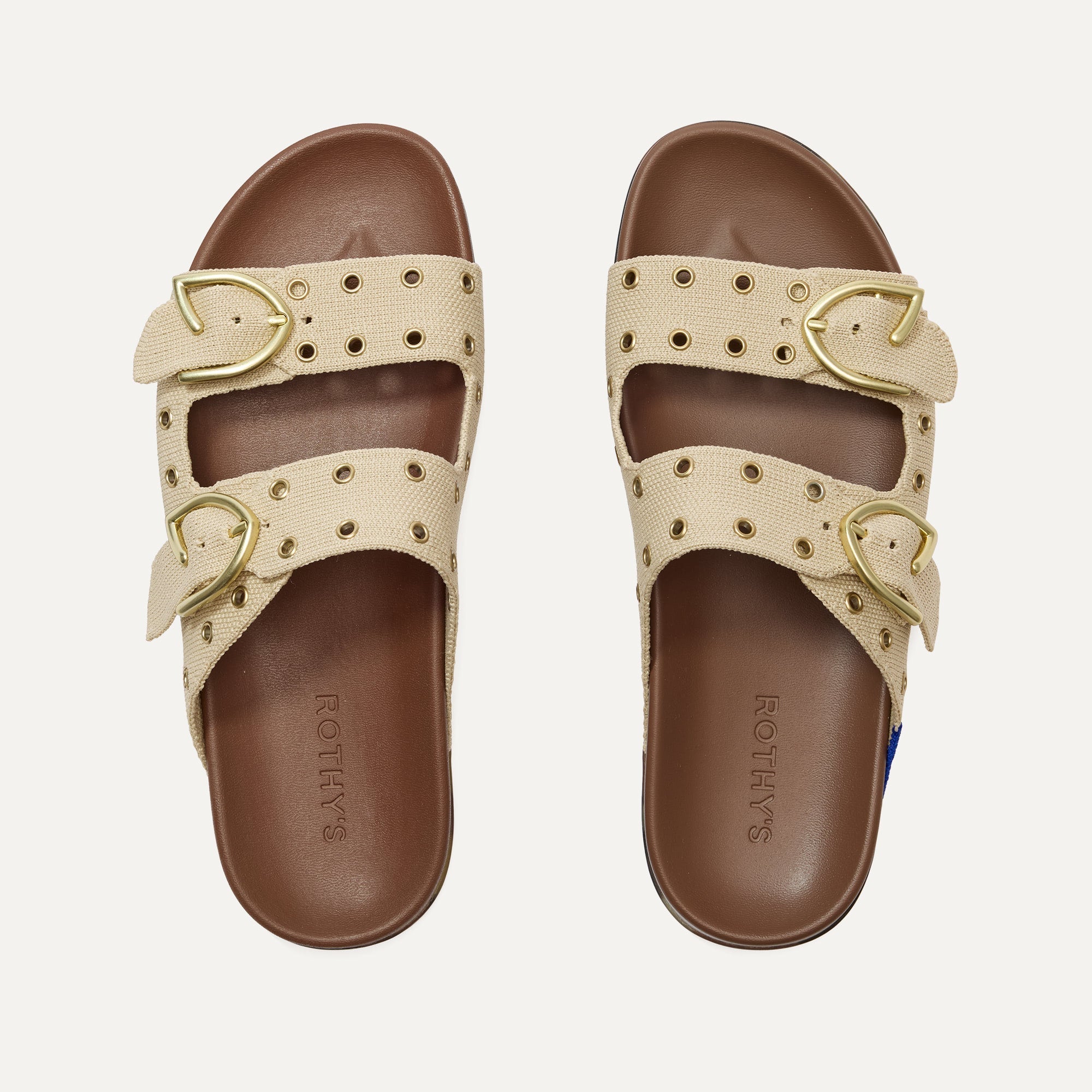The Buckle Slide in Eyelet Wheat shown from the top.