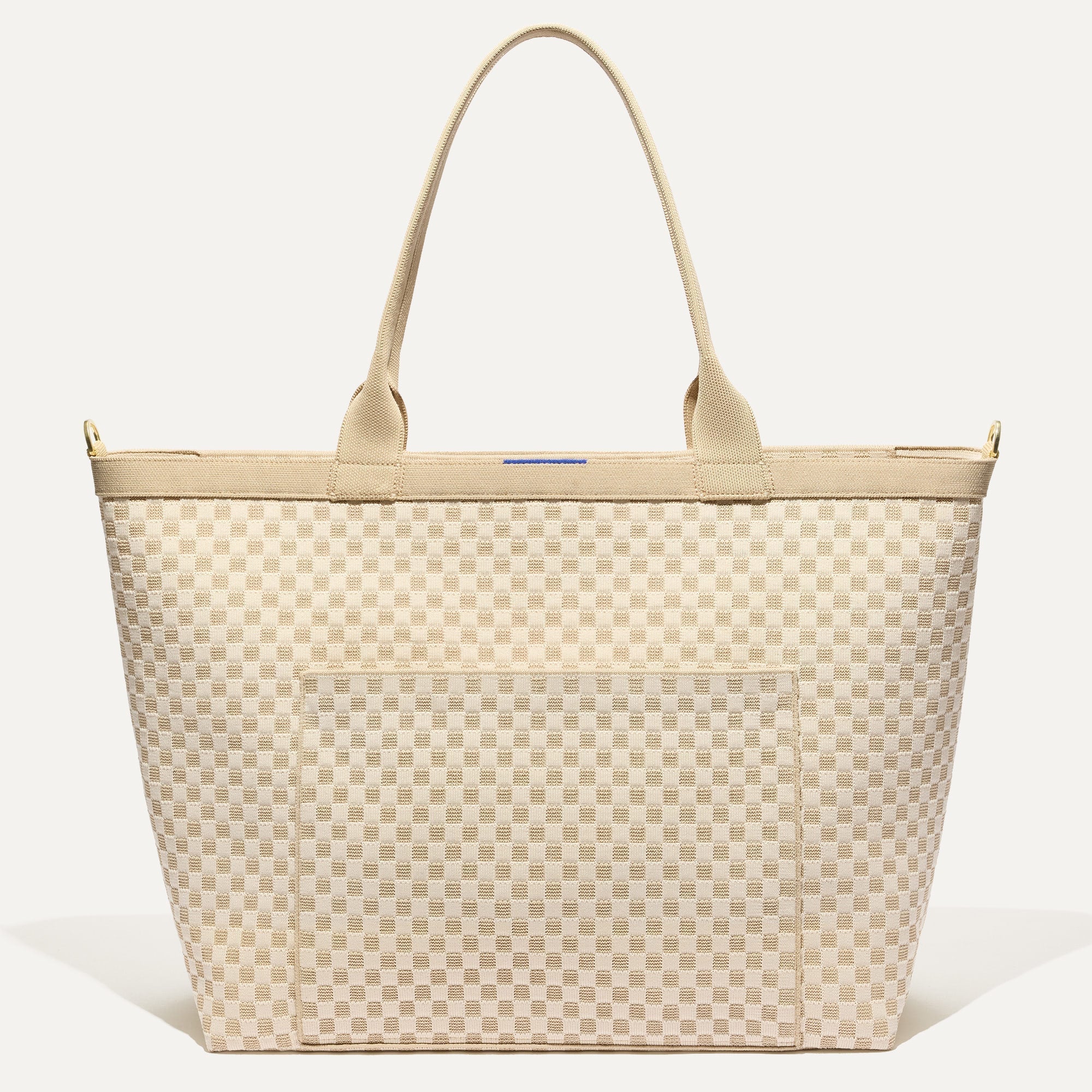 PLP |The Zip Travel Tote in  Parchment Basketweave shown from the front.