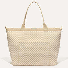 PLP |The Zip Travel Tote in  Parchment Basketweave shown from the front.