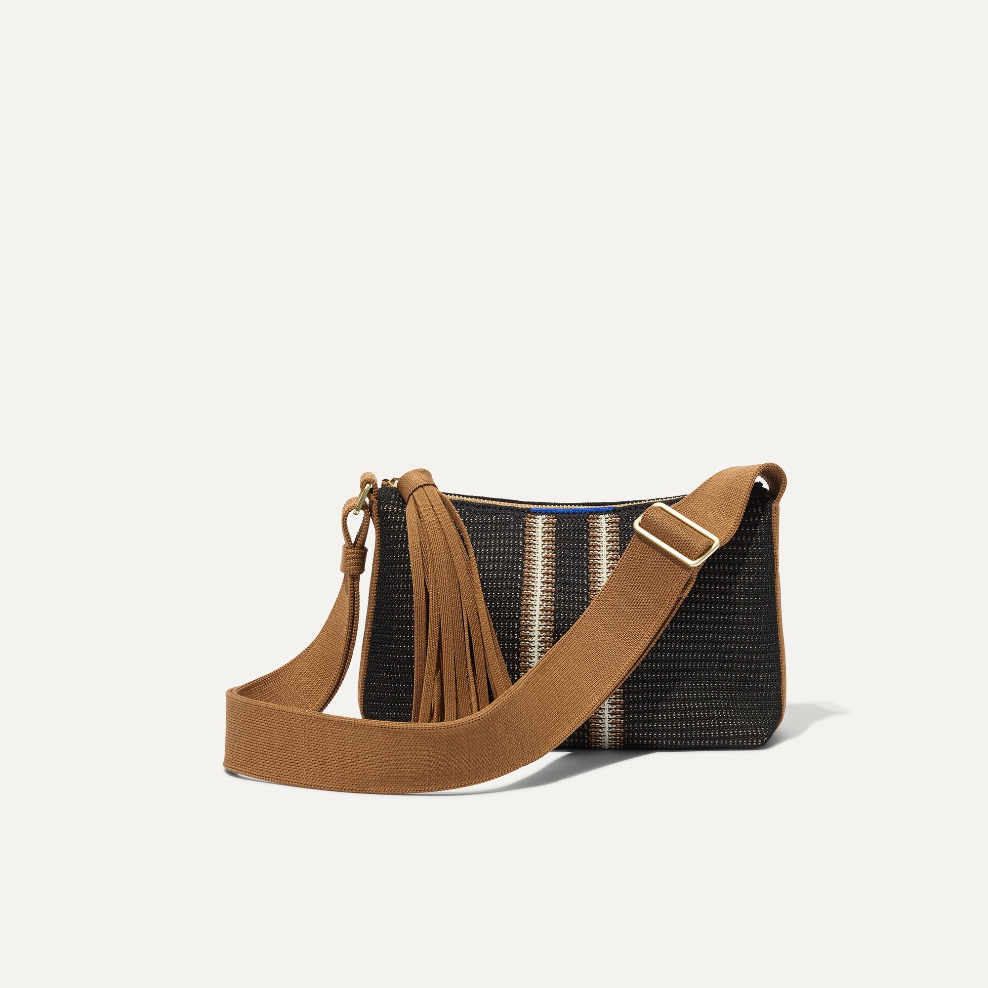 PLP |The Casual Crossbody in Coffee Market Stripe shown from the front.