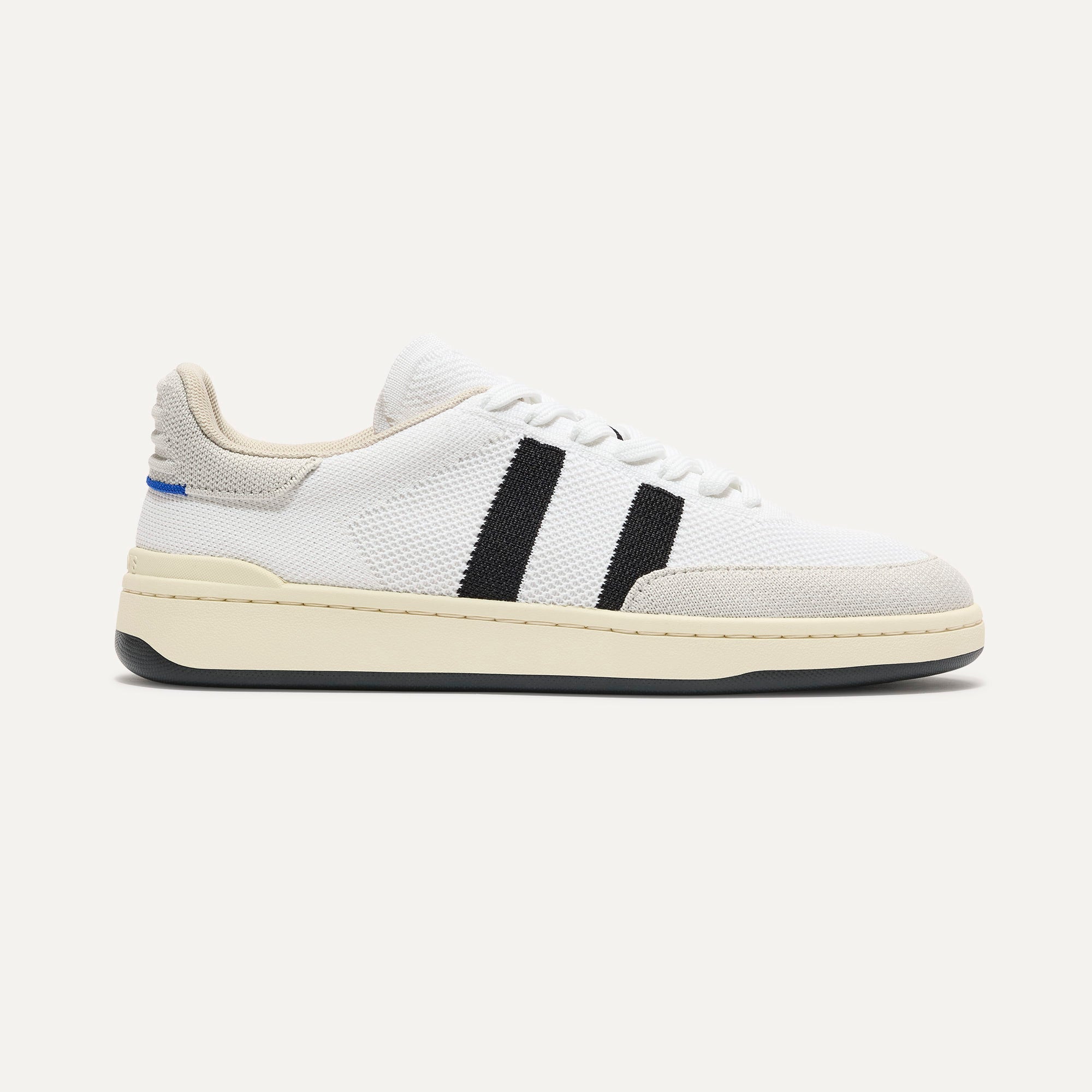 side | The Men's Court Sneaker in Black Drift shown from the side. 