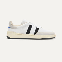 side | The Men's Court Sneaker in Black Drift shown from the side. 