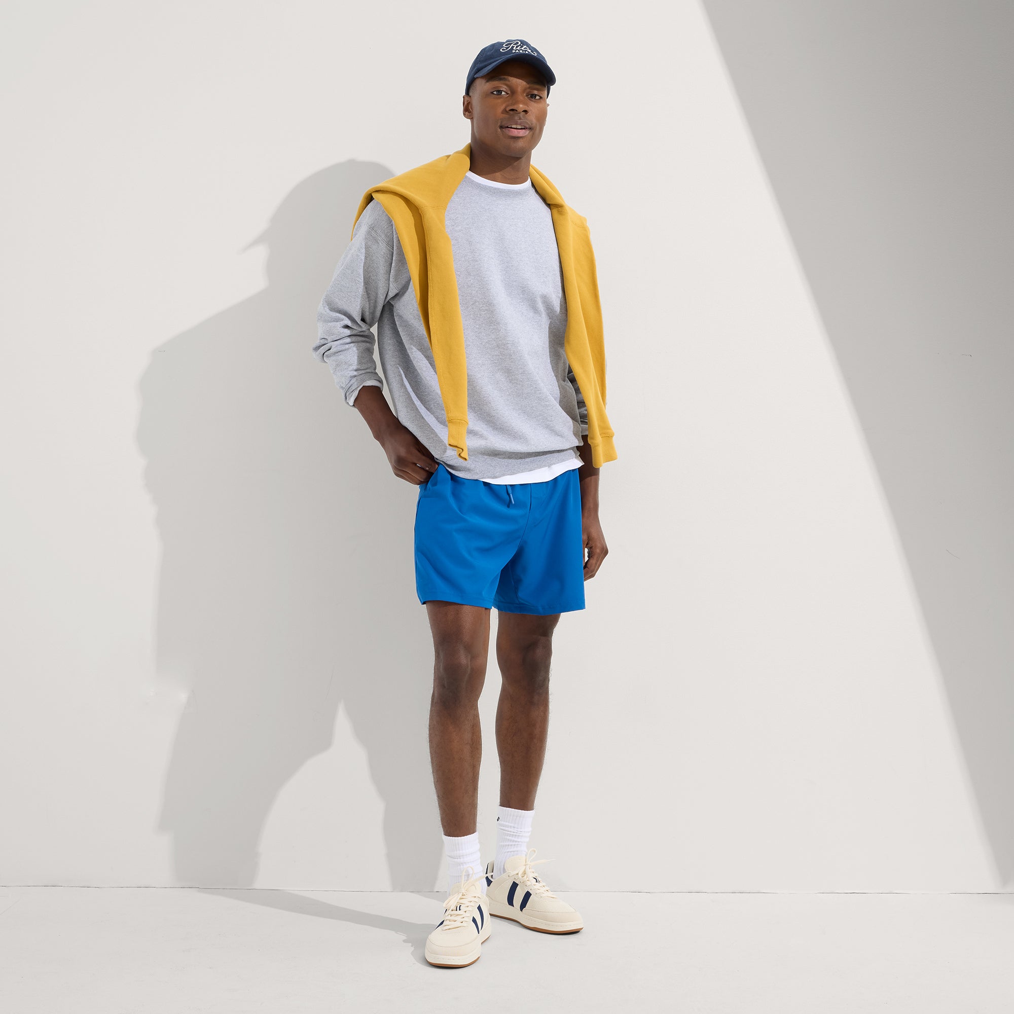model | Alternate view of a model wearing The Men's Court Sneaker in Freestyle. 