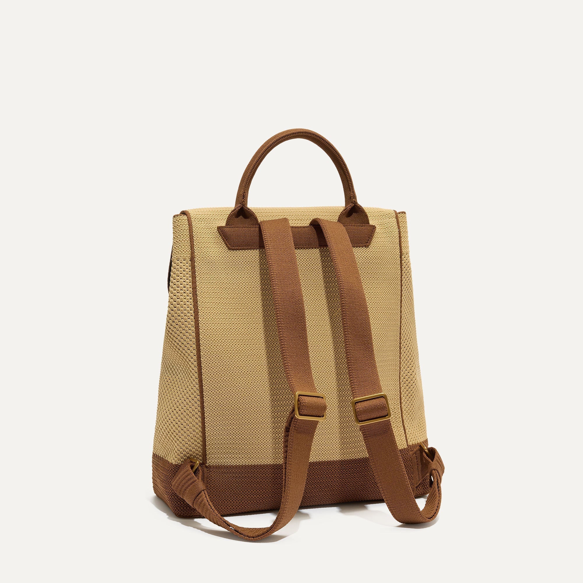 The Cinch Backpack in Brown Butter shown from the back.
