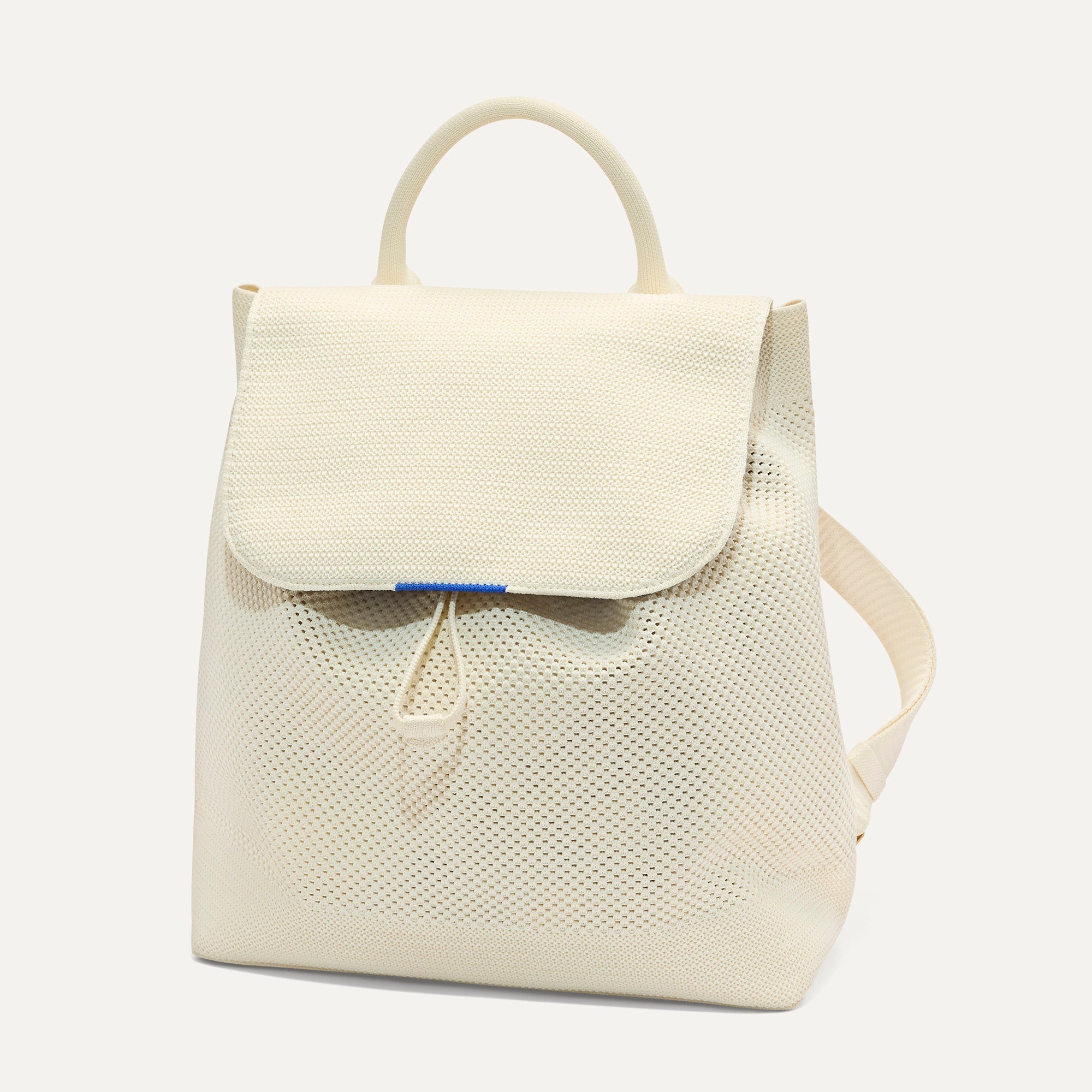 PDP | The Cinch Backpack in Coconut Crochet shown from the front.
