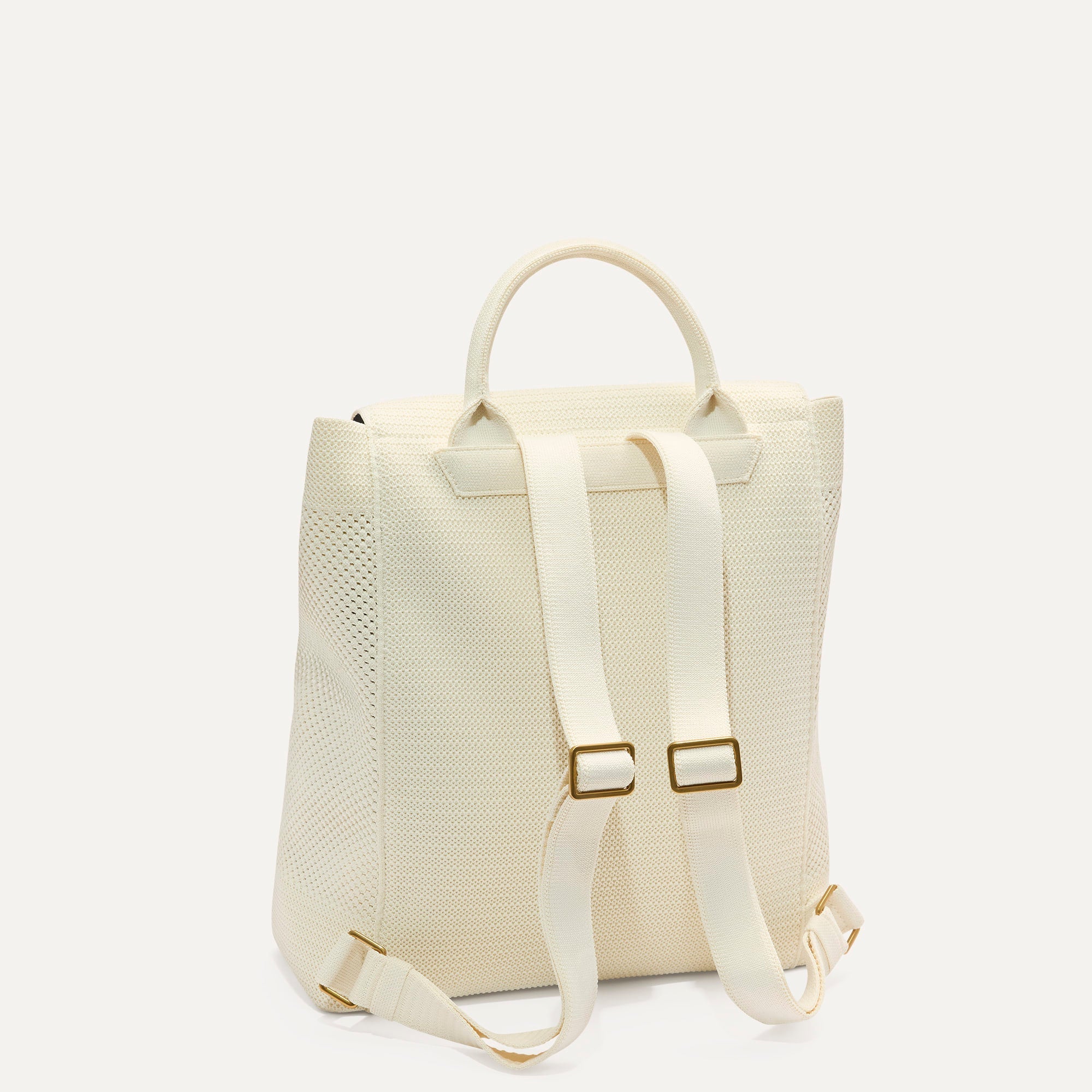 The Cinch Backpack in Coconut Crochet shown from the back.