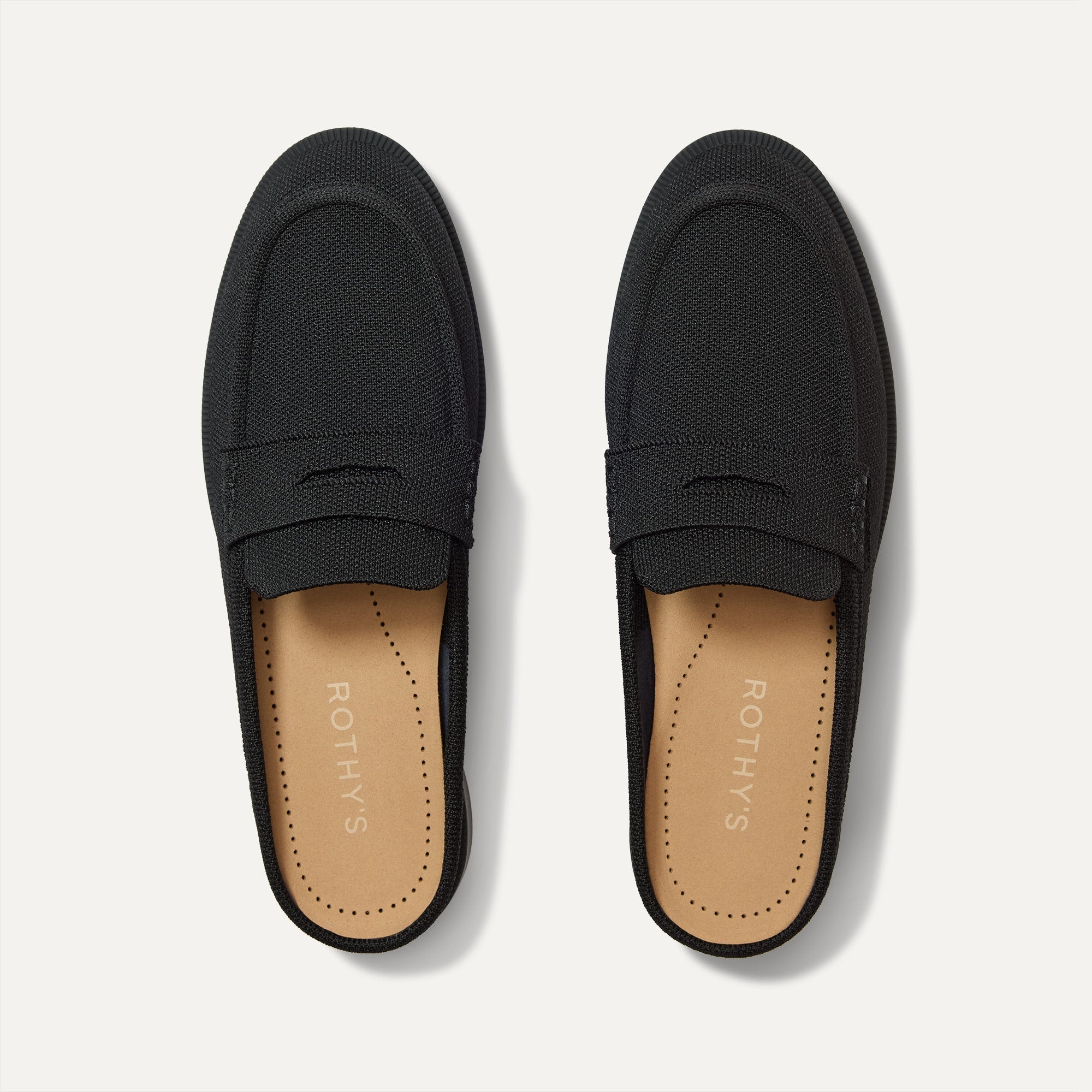 The Penny Loafer Mule in Black shown from the top.