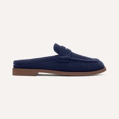 side | The Penny Loafer Mule in ReVelvet Navy shown from the side.