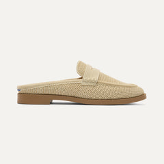 side | The Penny Loafer Mule in Sandstone Raffia-Knit shown from the side.