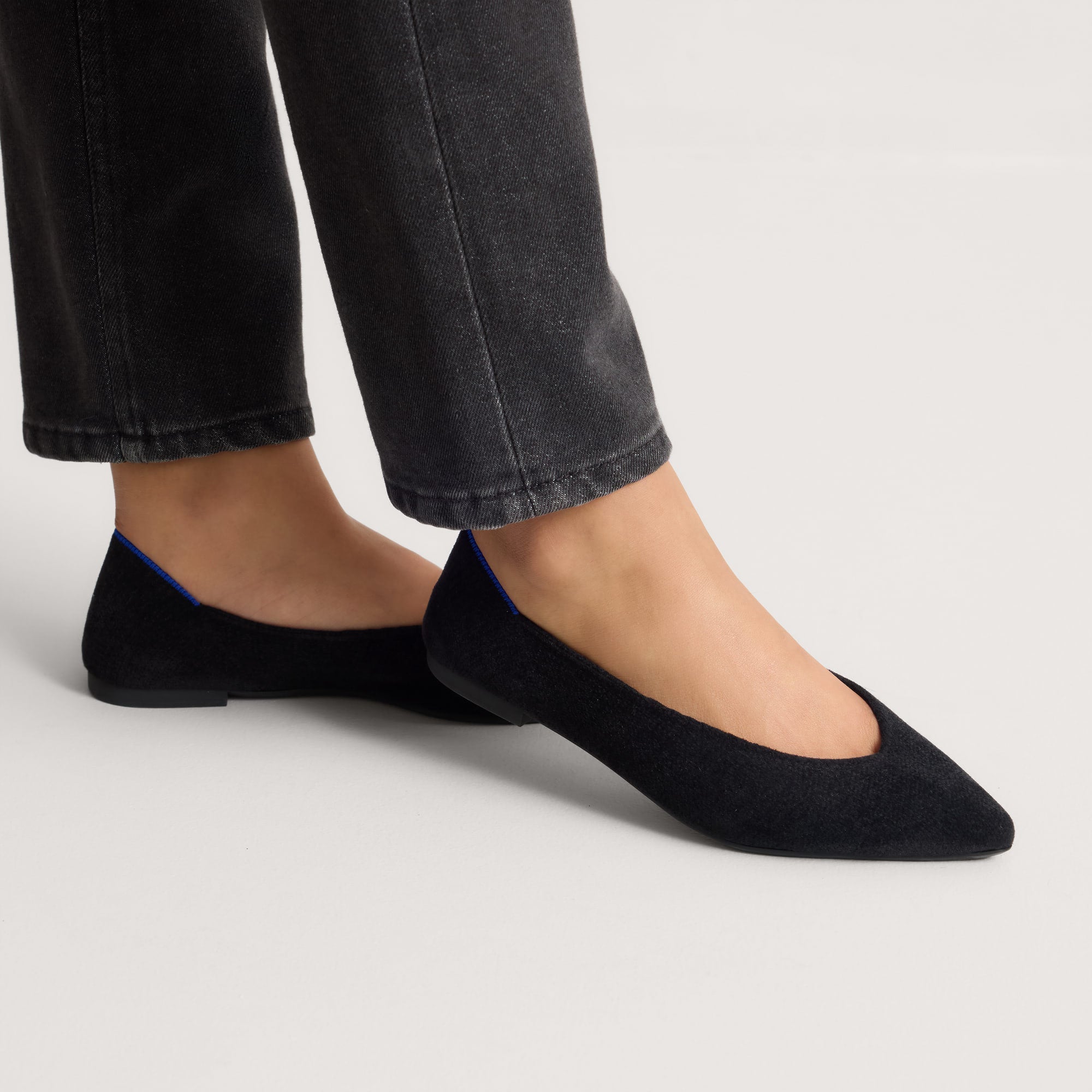 hover | Model wearing The Point III in ReVelvet Black. 