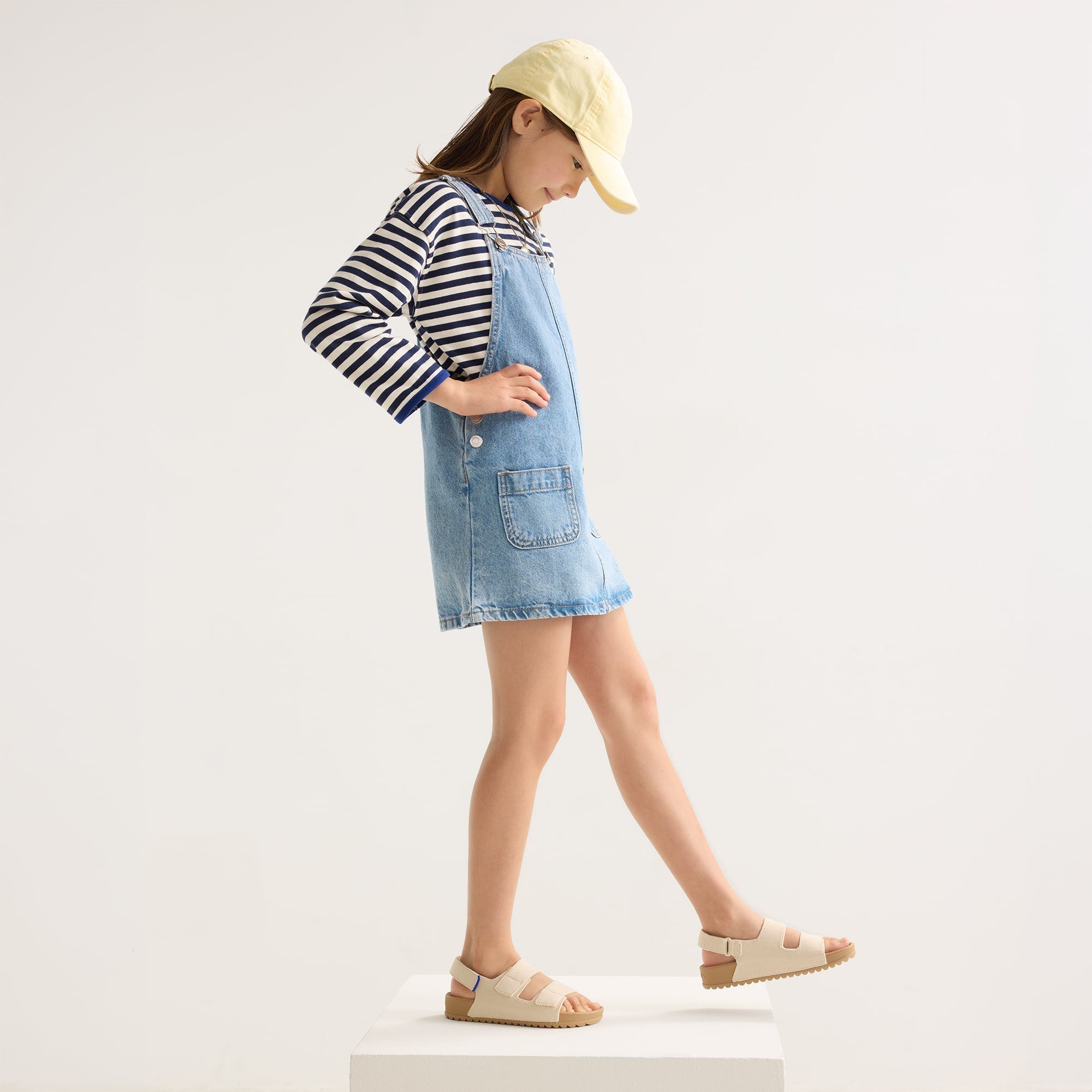 model | Alternate view of a girl wearing The Kids Double Strap Sandal in Conch.