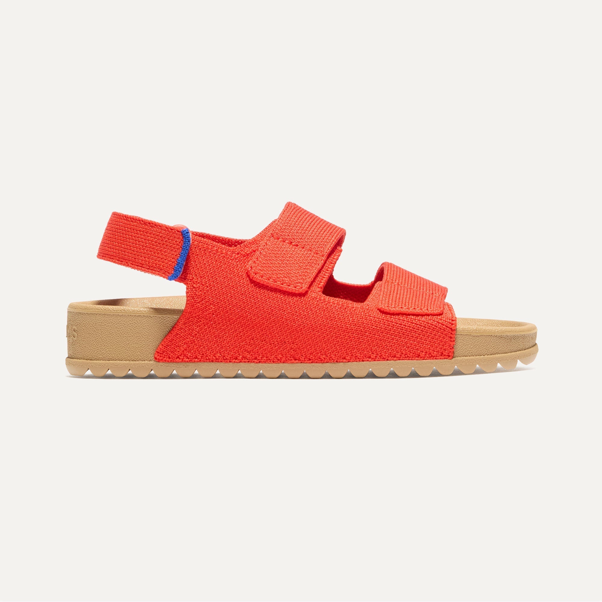 side | The Kids Double Strap Sandal in Firetruck Red shown from the side.