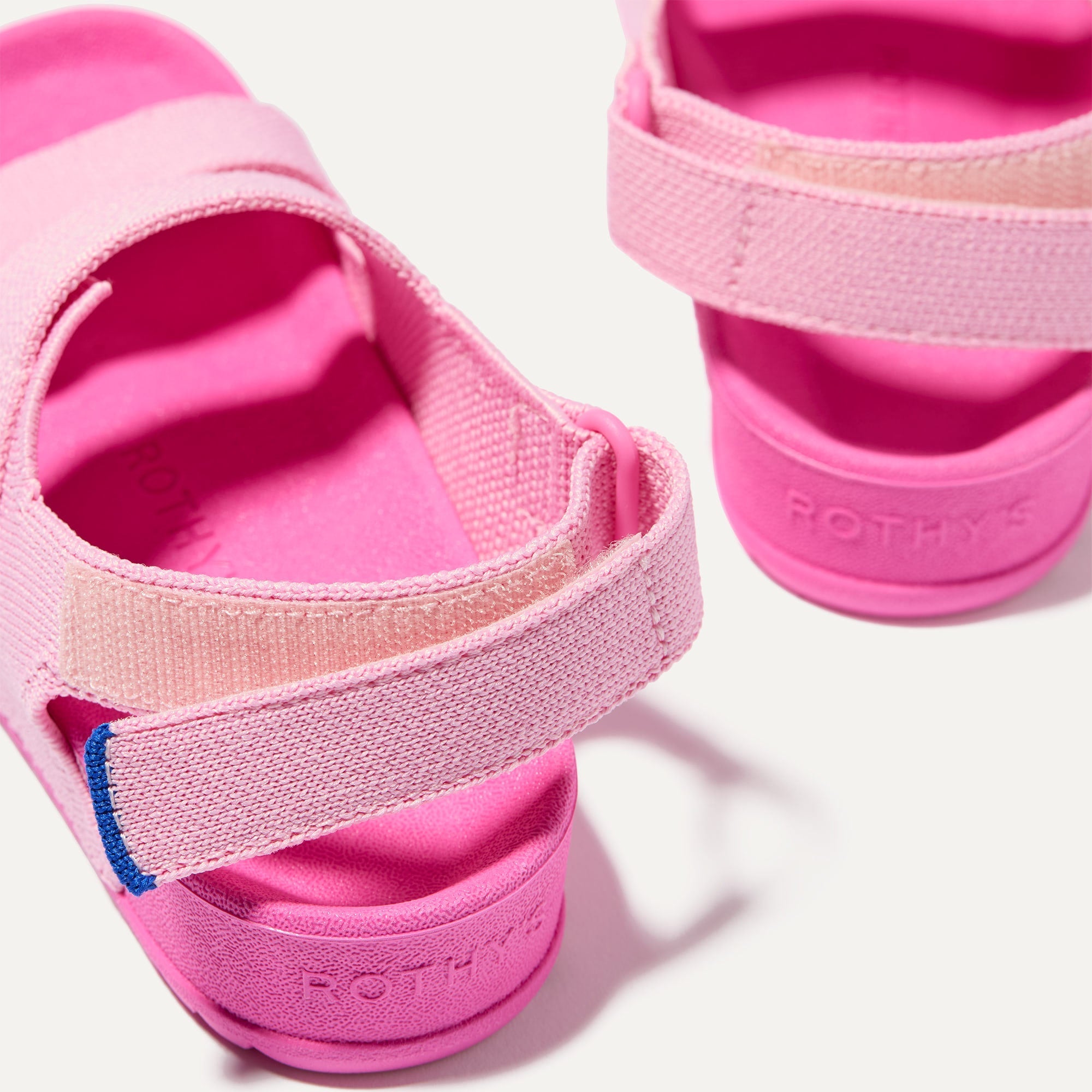 Close up of the velcro heel strap on The Kids Double Strap Sandal in Tutu.