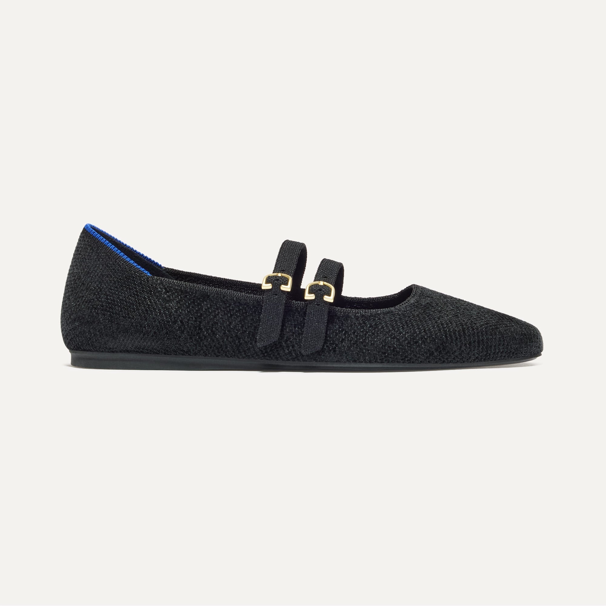 side | The Double Buckle Mary Jane in ReVelvet™ Black shown from the side.