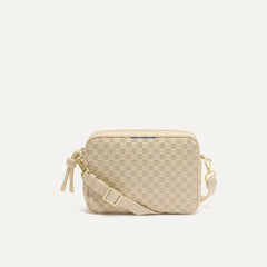 PLP |The Crossbody Camera Bag in  Sesame, shown from the front. 