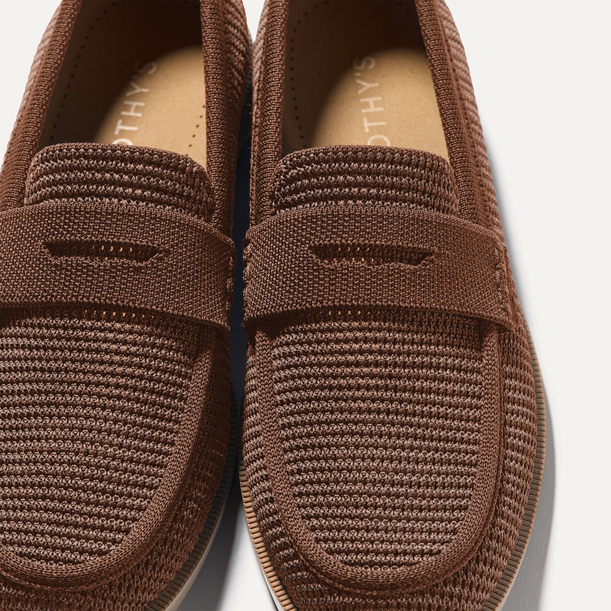 Close up of the toe box and penny keeper of The Penny Loafer in Cinnamon Raffia-Knit.