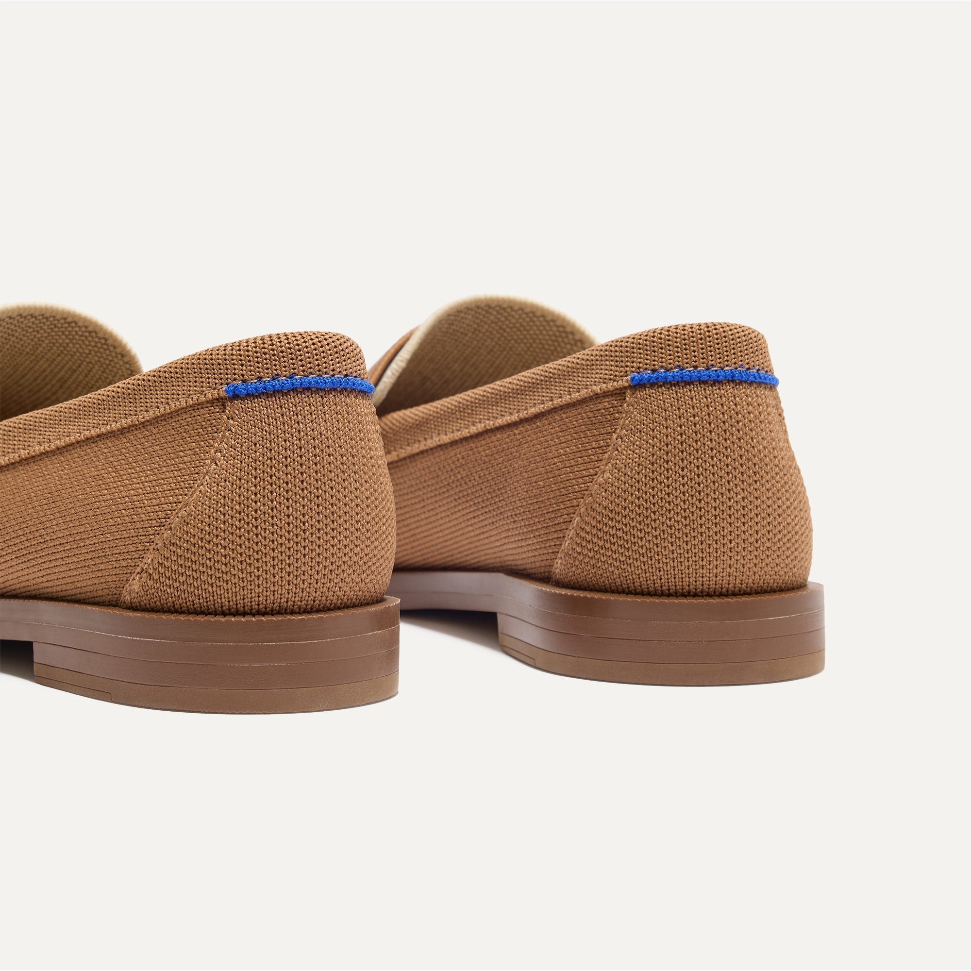 Close up of the heel of The Penny Loafer in Cortado, with Rothy's signature blue halo. 